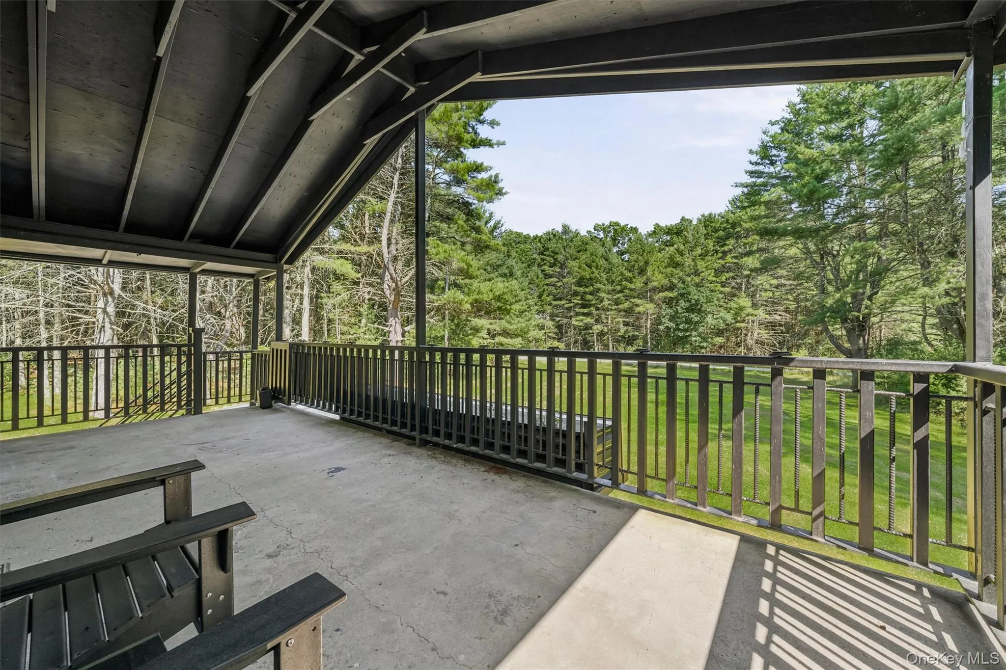 Front porch facing yard and entry door Front porch facing yard and entry door