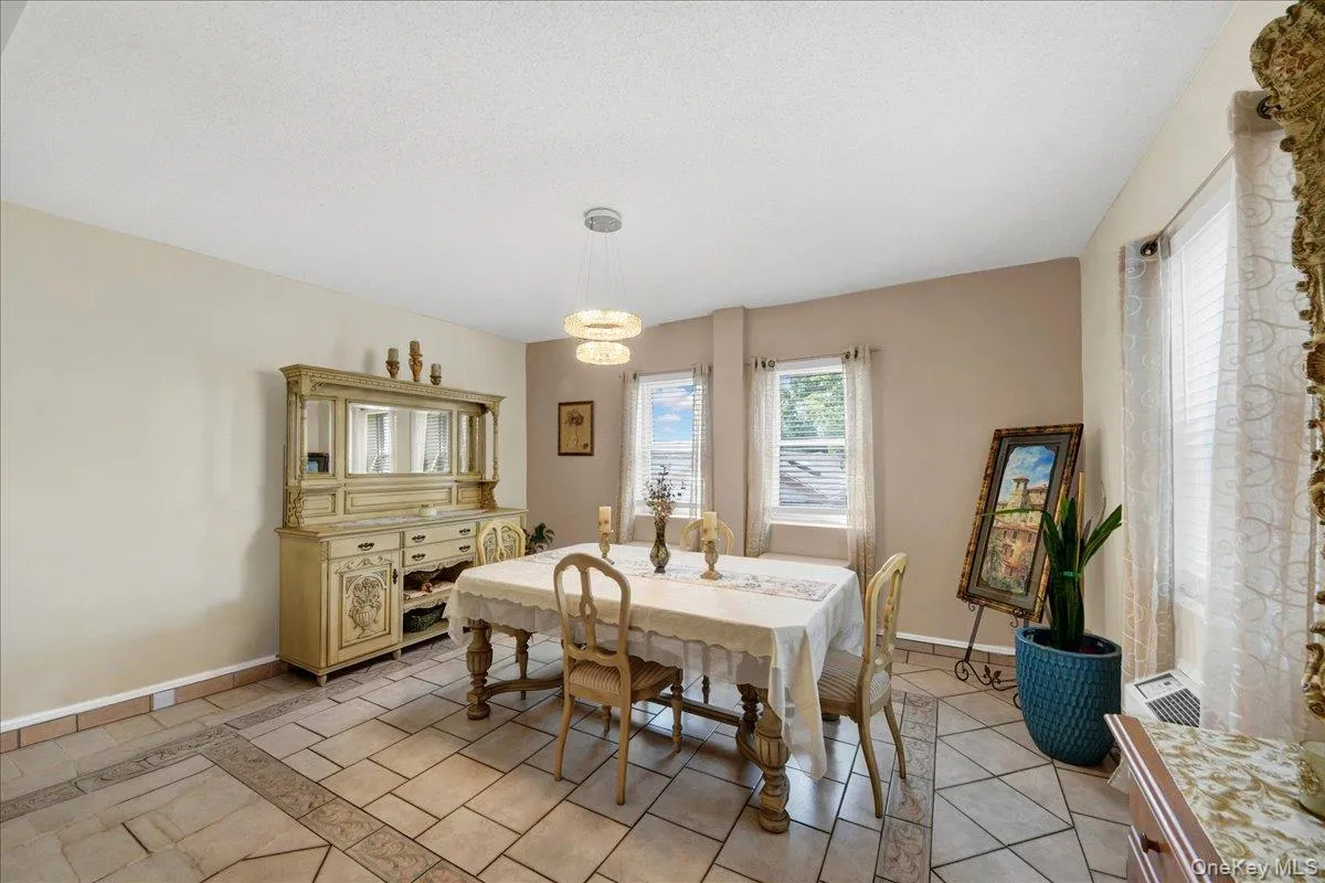 Formail dining room for grand dinners adjacent to kitchen for hosting holidays Formail dining room for grand dinners adjacent to kitchen for hosting holidays