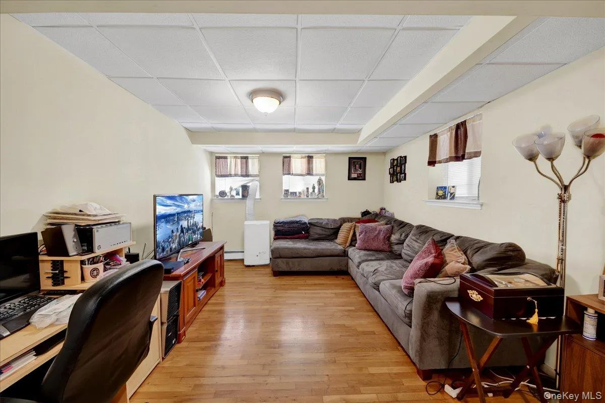 Living room with hardwood flooring in in-law Living room with hardwood flooring in in-law