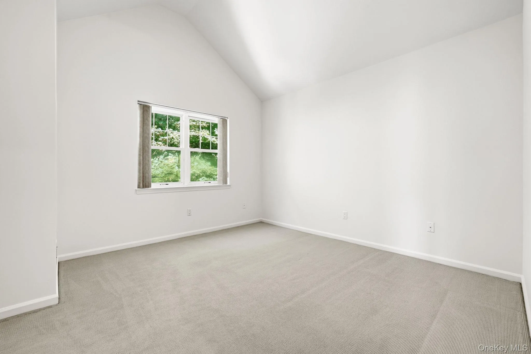 The sizeable second bedroom has tree-top views and direct access into the second bathroom on this level The sizeable second bedroom has tree-top views and direct access into the second bathroom on this level
