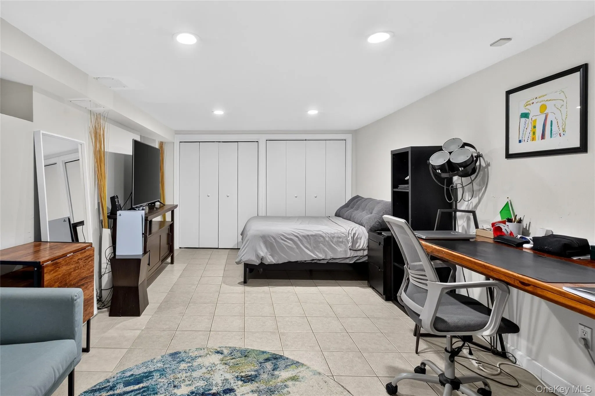 Lower level bonus room with door to backyard Lower level bonus room with door to backyard