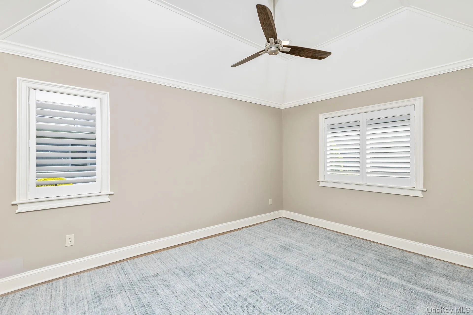 Primary Bedroom with Custom Graber Shutters Primary Bedroom with Custom Graber Shutters