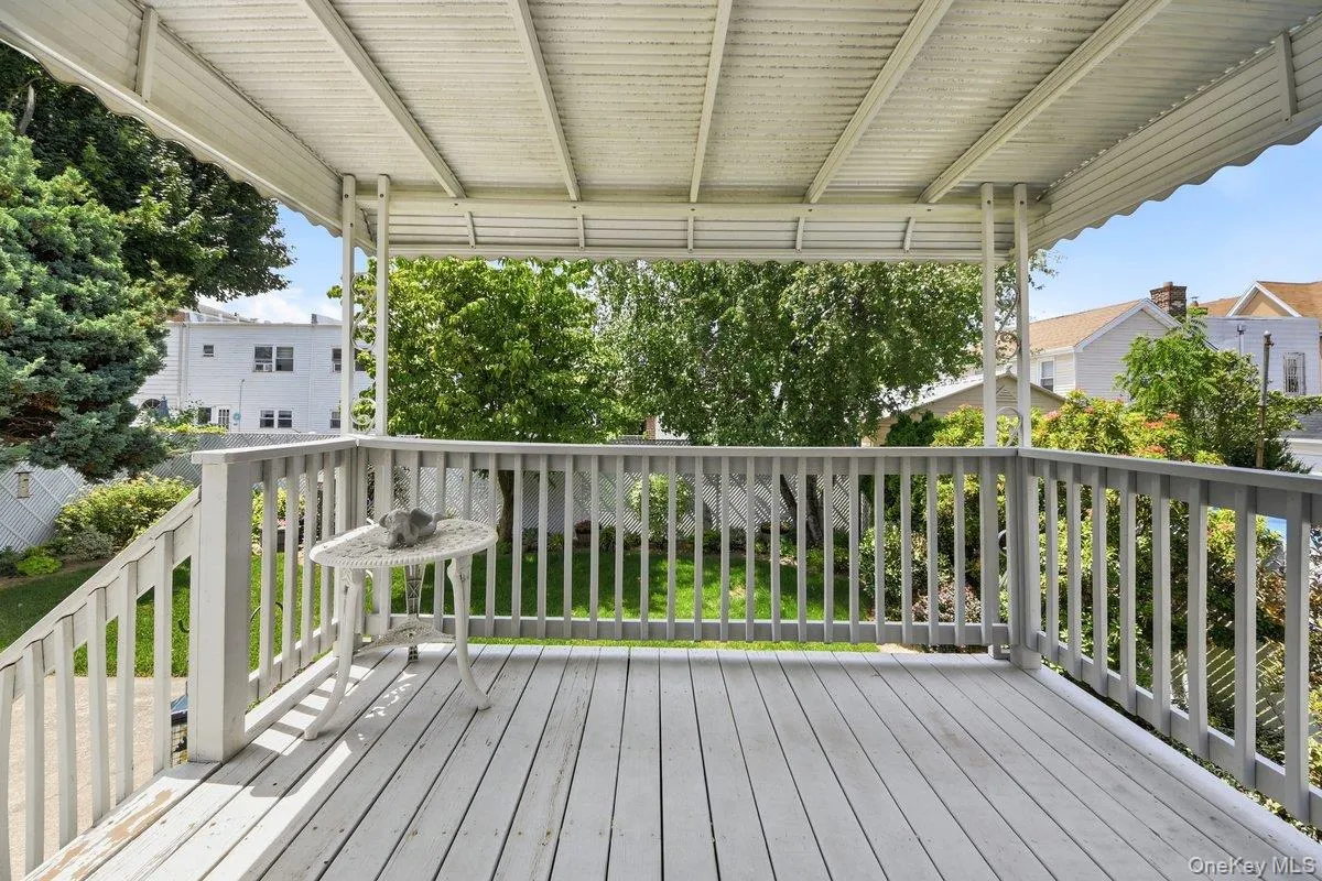 Expansive outdoor deck off of the kitchen, featuring composite decking, a protective overhead covering Expansive outdoor deck off of the kitchen, featuring composite decking, a protective overhead covering
