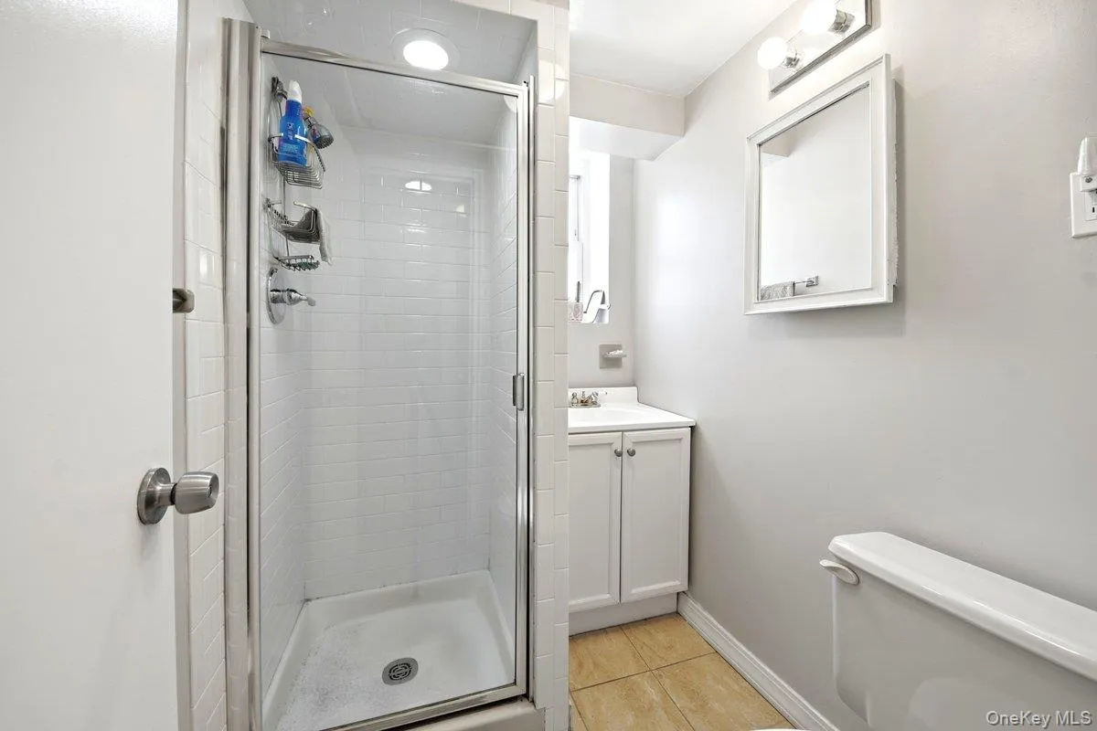 Glass-enclosed shower Glass-enclosed shower