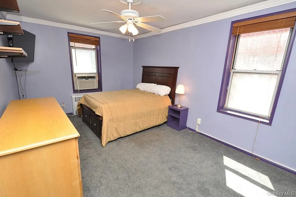 Large Corner Bedroom with two closets and covered hardwood floors. Large Corner Bedroom with two closets and covered hardwood floors.
