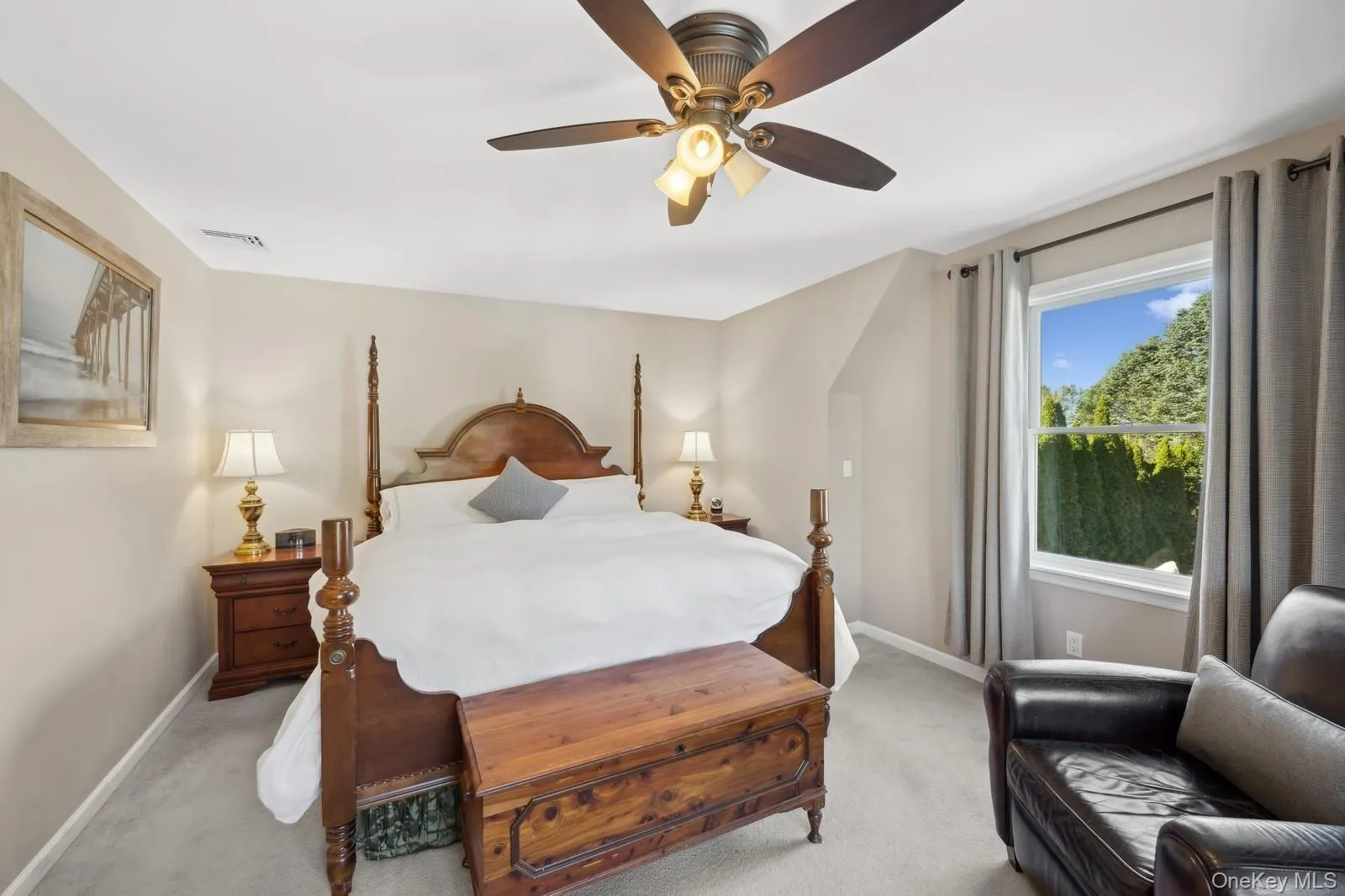 Carpeted bedroom with ceiling fan Carpeted bedroom with ceiling fan