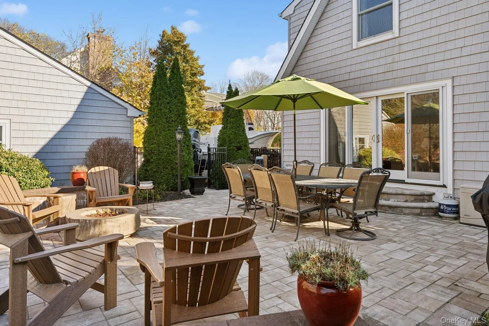 View of patio with a fire pit View of patio with a fire pit