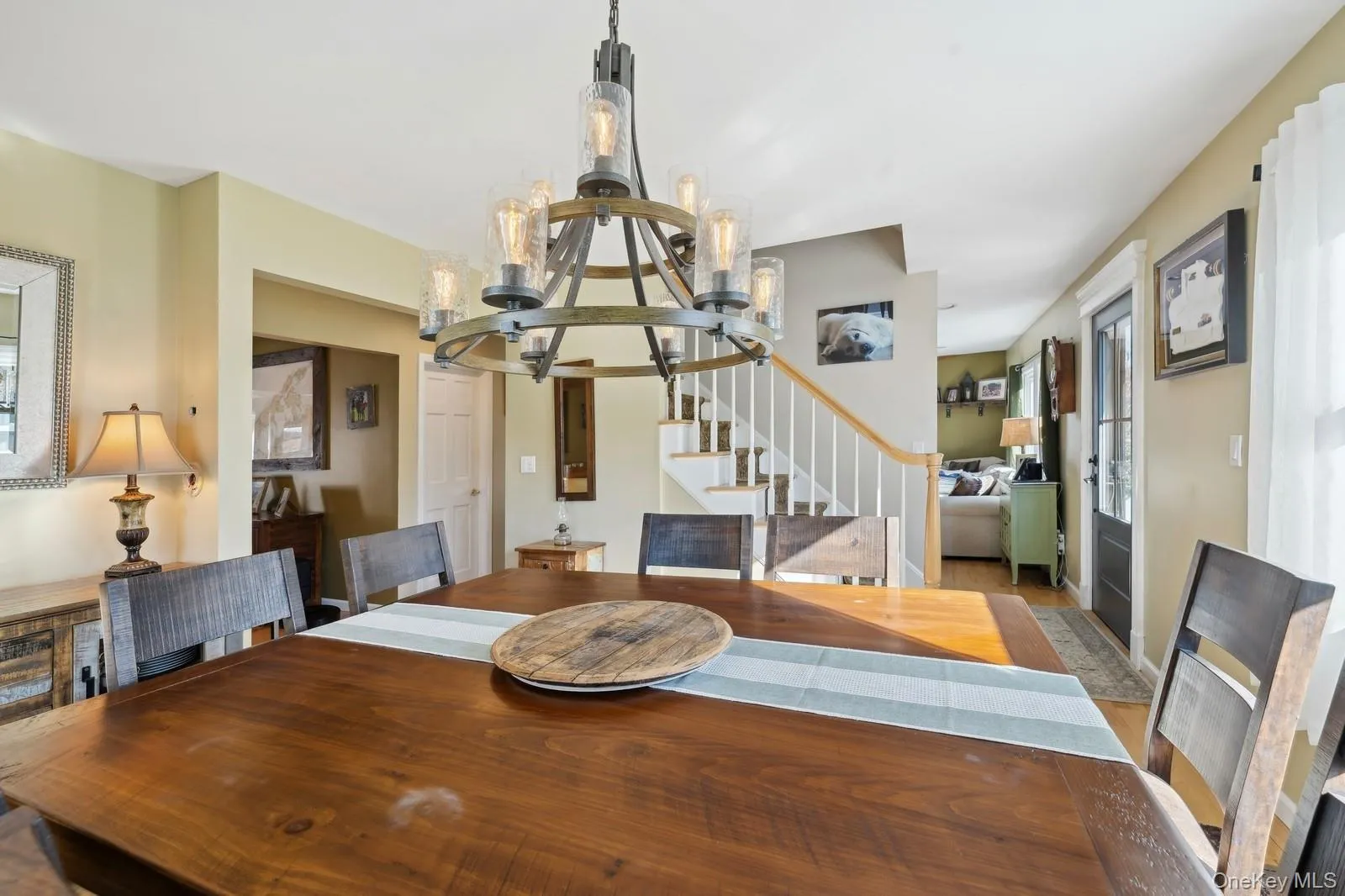 Dining area featuring a chandelier Dining area featuring a chandelier