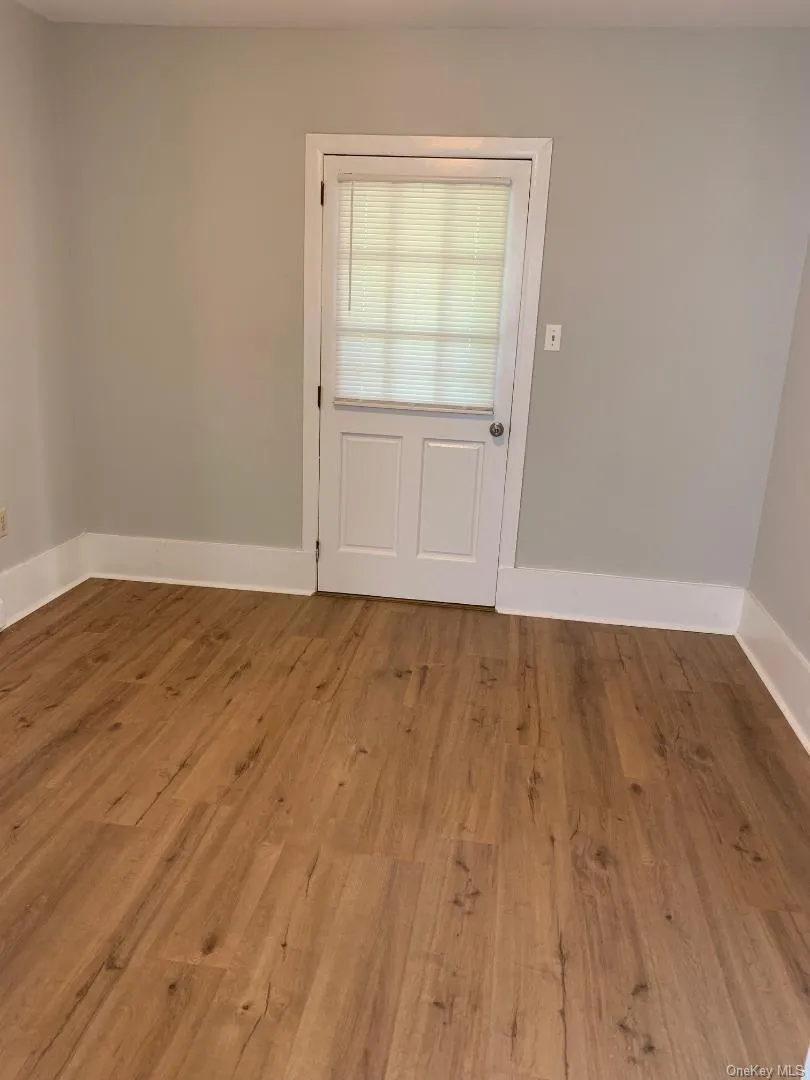 There's a very flexible floorplan - this can be a cozy living room or an office/den There's a very flexible floorplan - this can be a cozy living room or an office/den