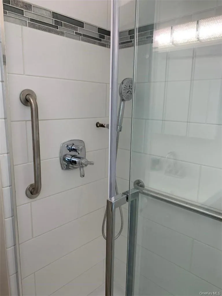 Bathroom with a shower with shower door Bathroom with a shower with shower door