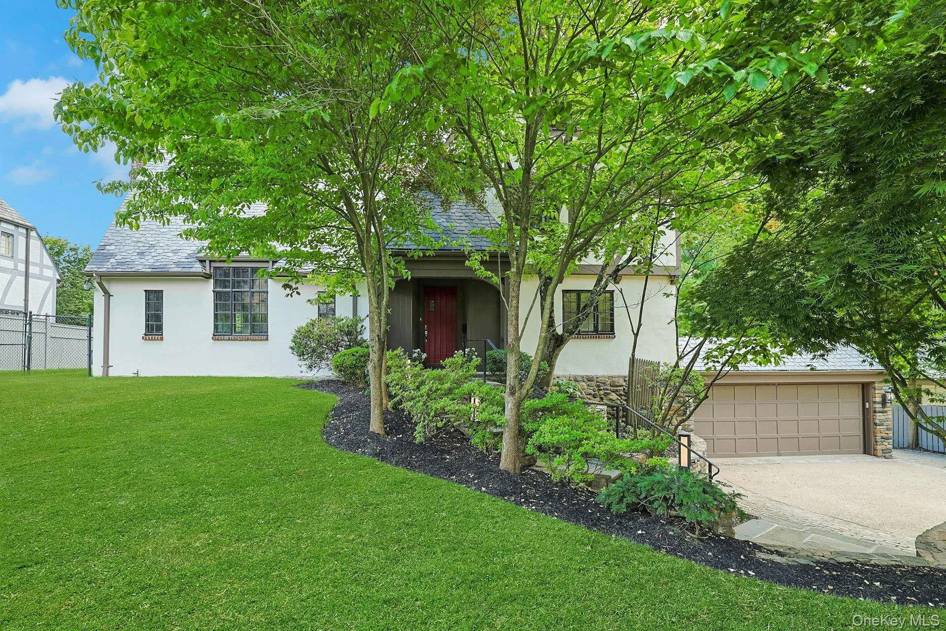 Set on a beautifully landscaped property surrounded by mature trees, this exceptional home offers unparalleled curb appeal, a coveted slate roof, and an idyllic setting just moments from top-rated schools, Scarsdale downtown shops and the Metro North train. Set on a beautifully landscaped property surrounded by mature trees, this exceptional home offers unparalleled curb appeal, a coveted slate roof, and an idyllic setting just moments from top-rated schools, Scarsdale downtown shops and the Metro North train.