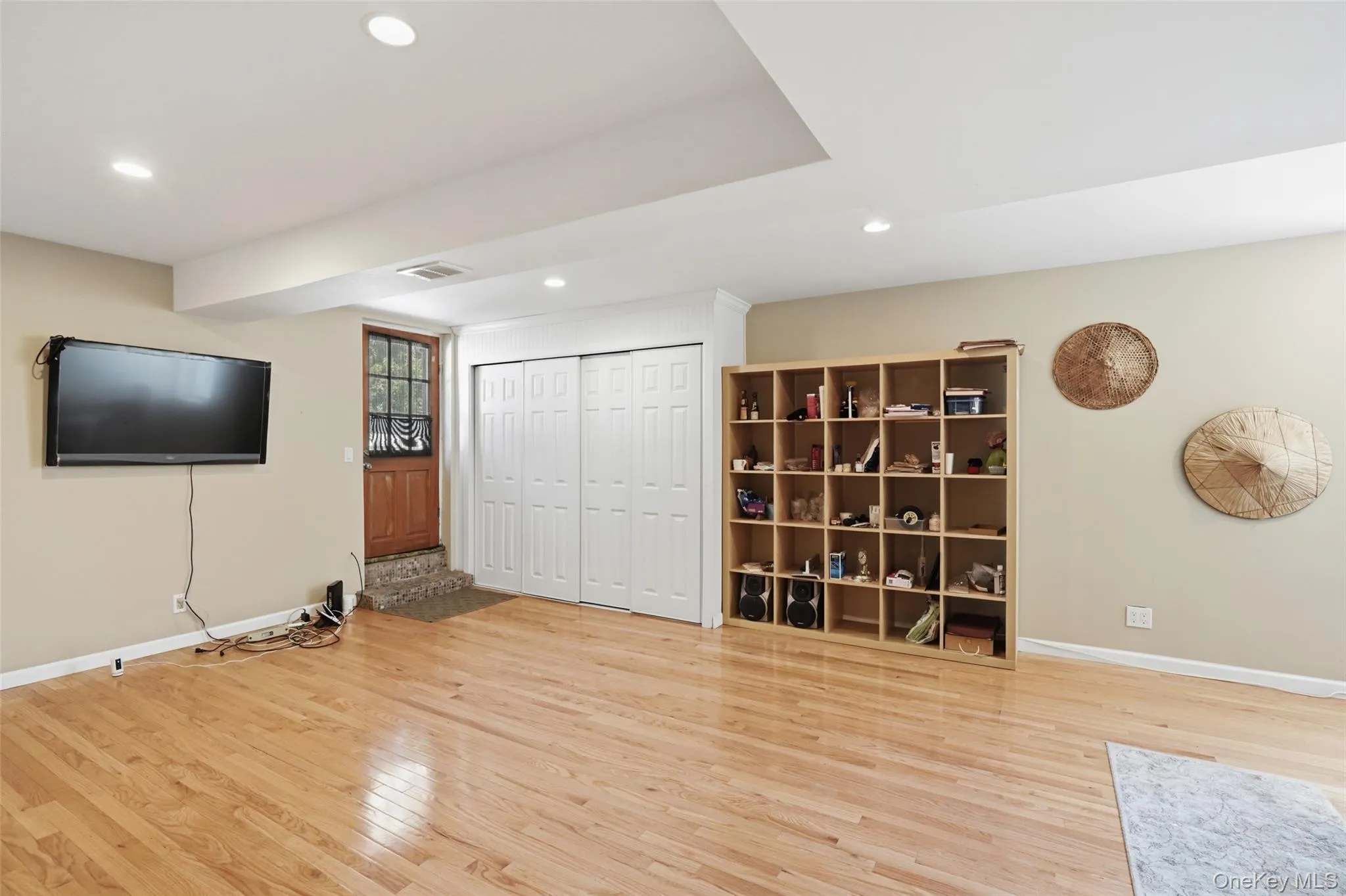 Finished basement with hardwood floors. Finished basement with hardwood floors.