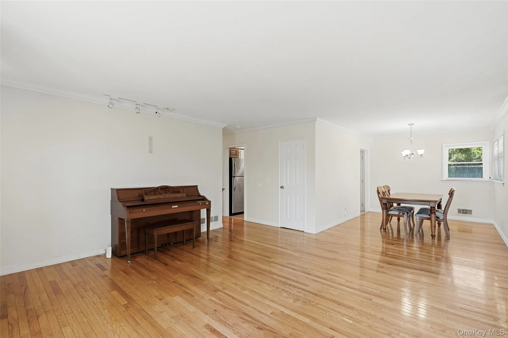 Living room/dining room combination situated off kitchen area. Living room/dining room combination situated off kitchen area.