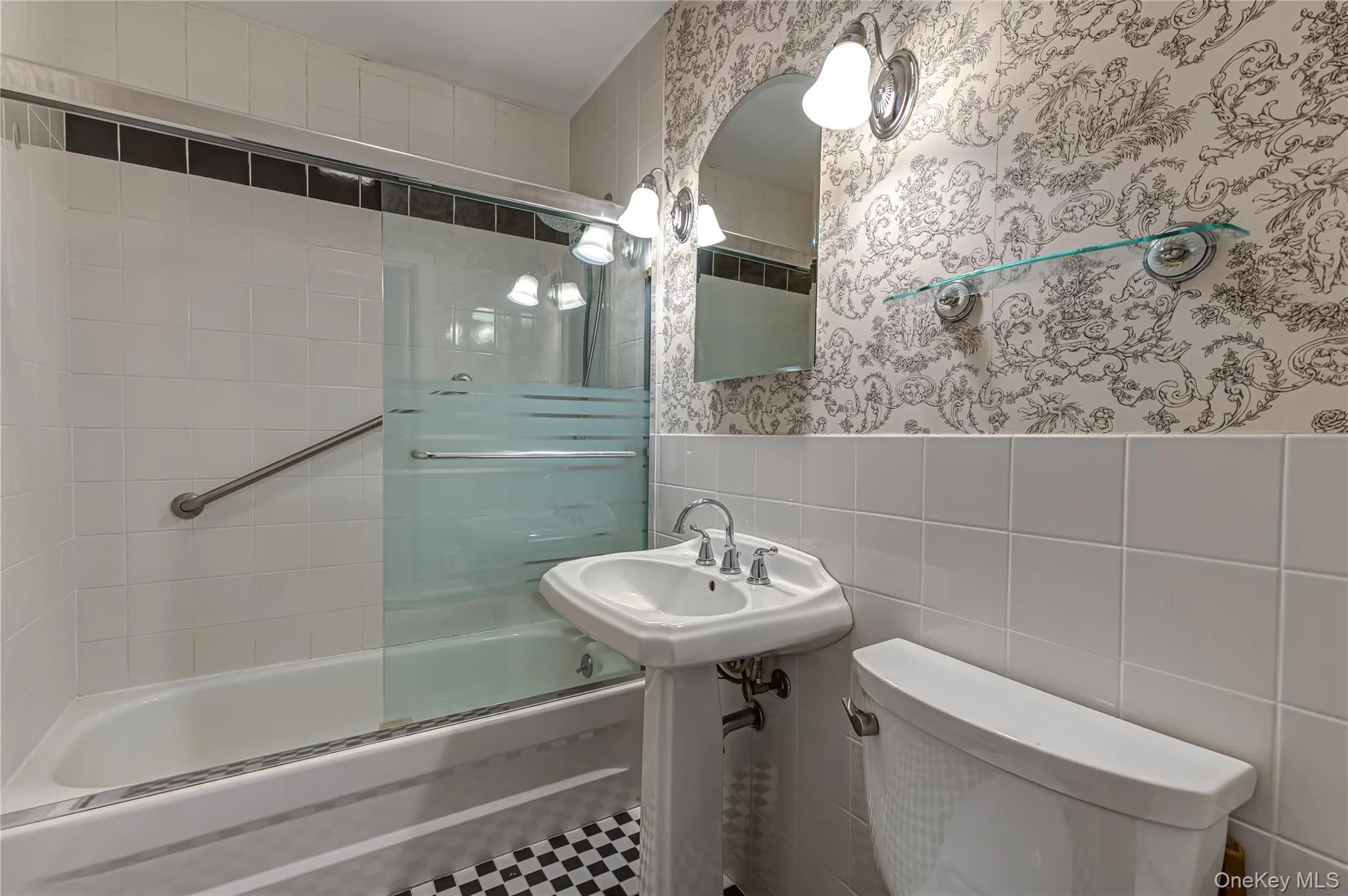 Renovated,Full Bathroom with Glass Shower Doors Renovated,Full Bathroom with Glass Shower Doors