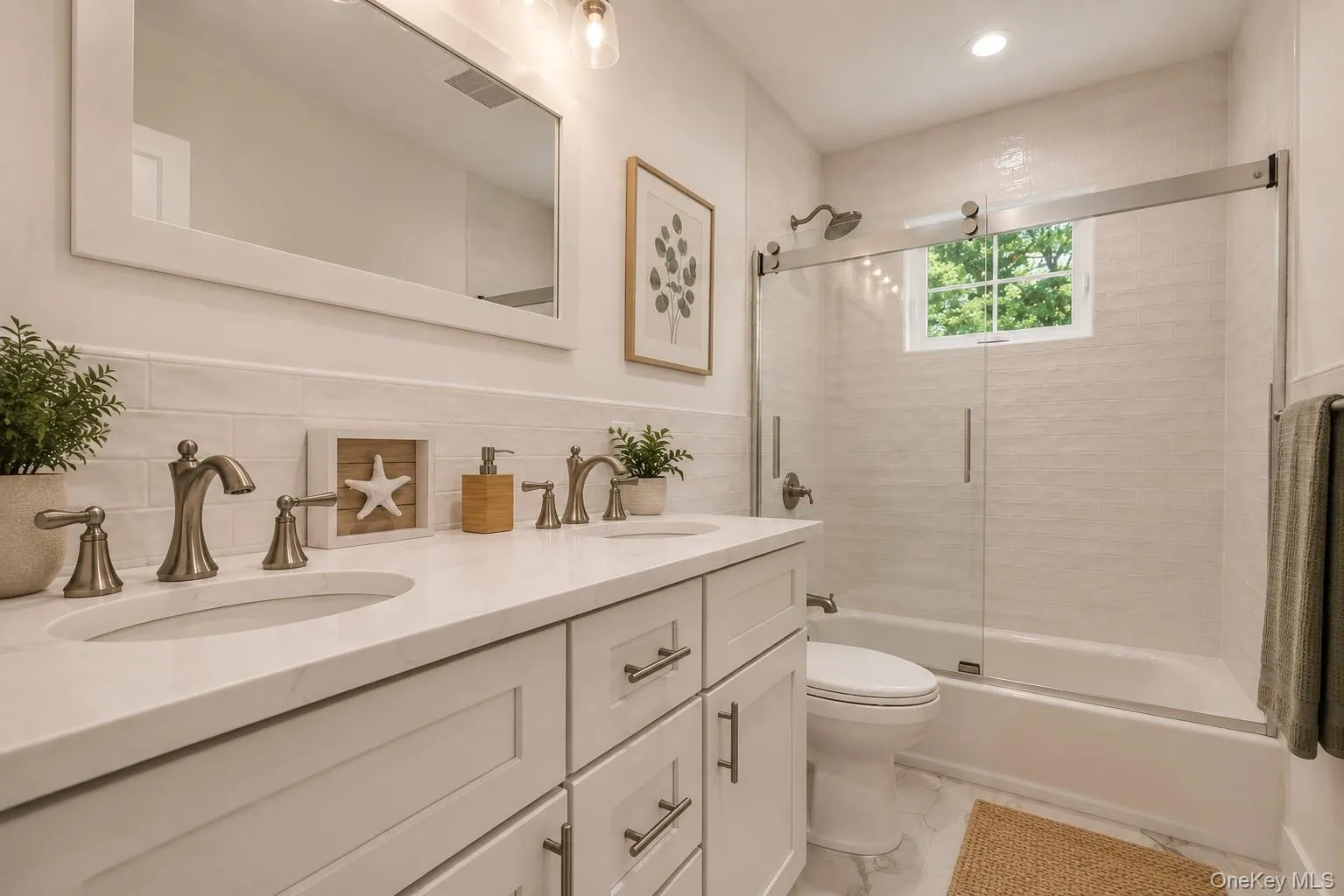 Hall Bathroom 2nf Fl with double sinks. Hall Bathroom 2nf Fl with double sinks.