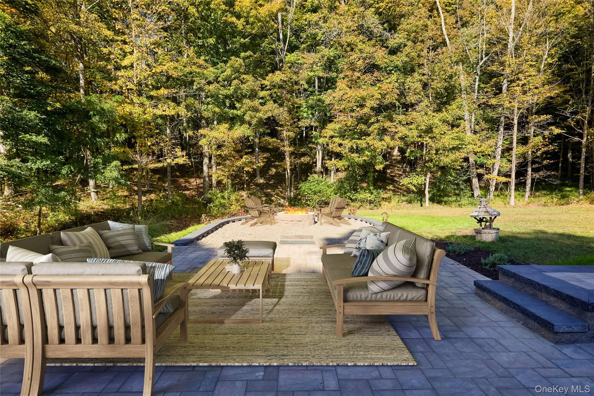 View of patio with an outdoor living space with a fire pit View of patio with an outdoor living space with a fire pit