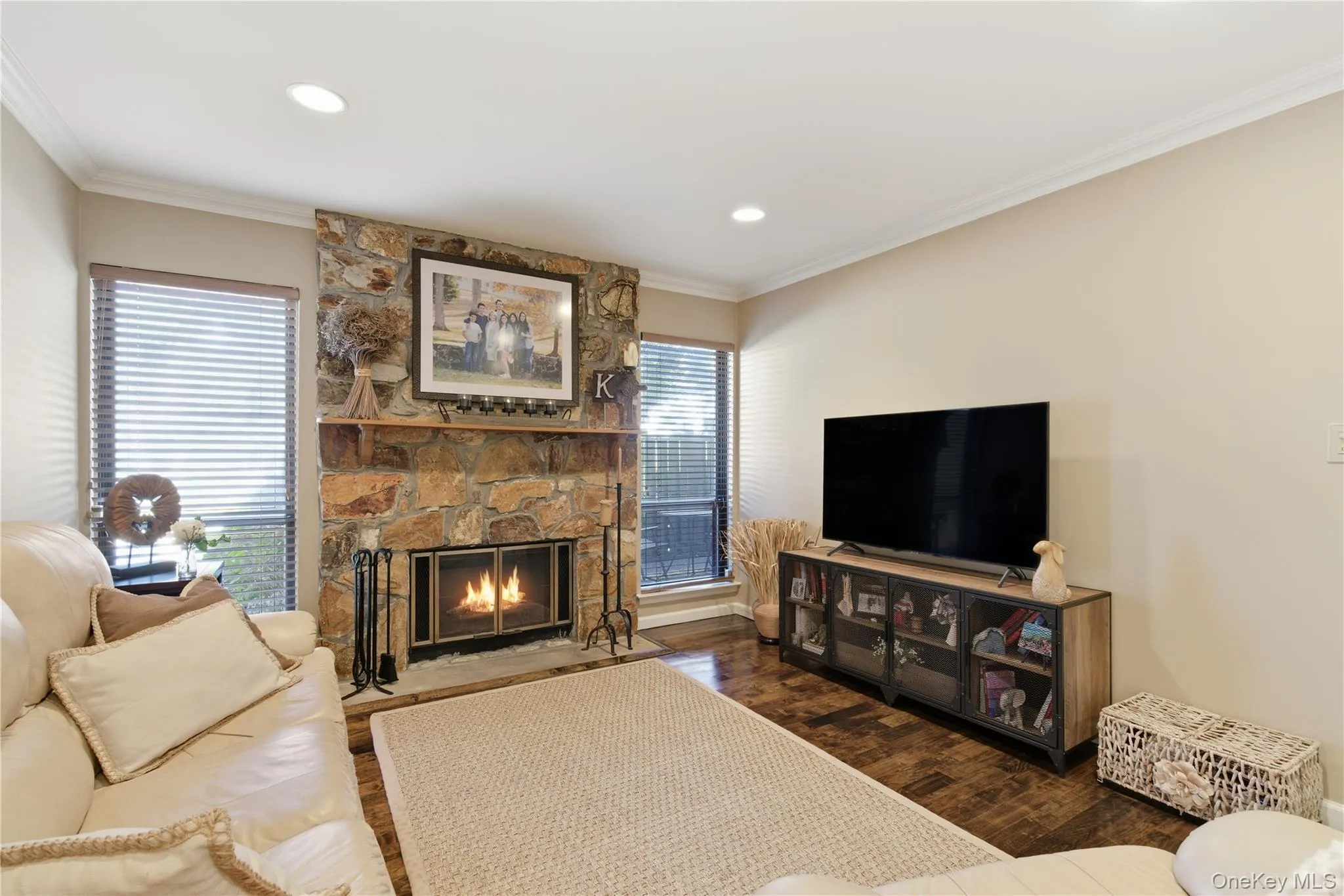 Cozy den retreat with a fireplace and media center Cozy den retreat with a fireplace and media center