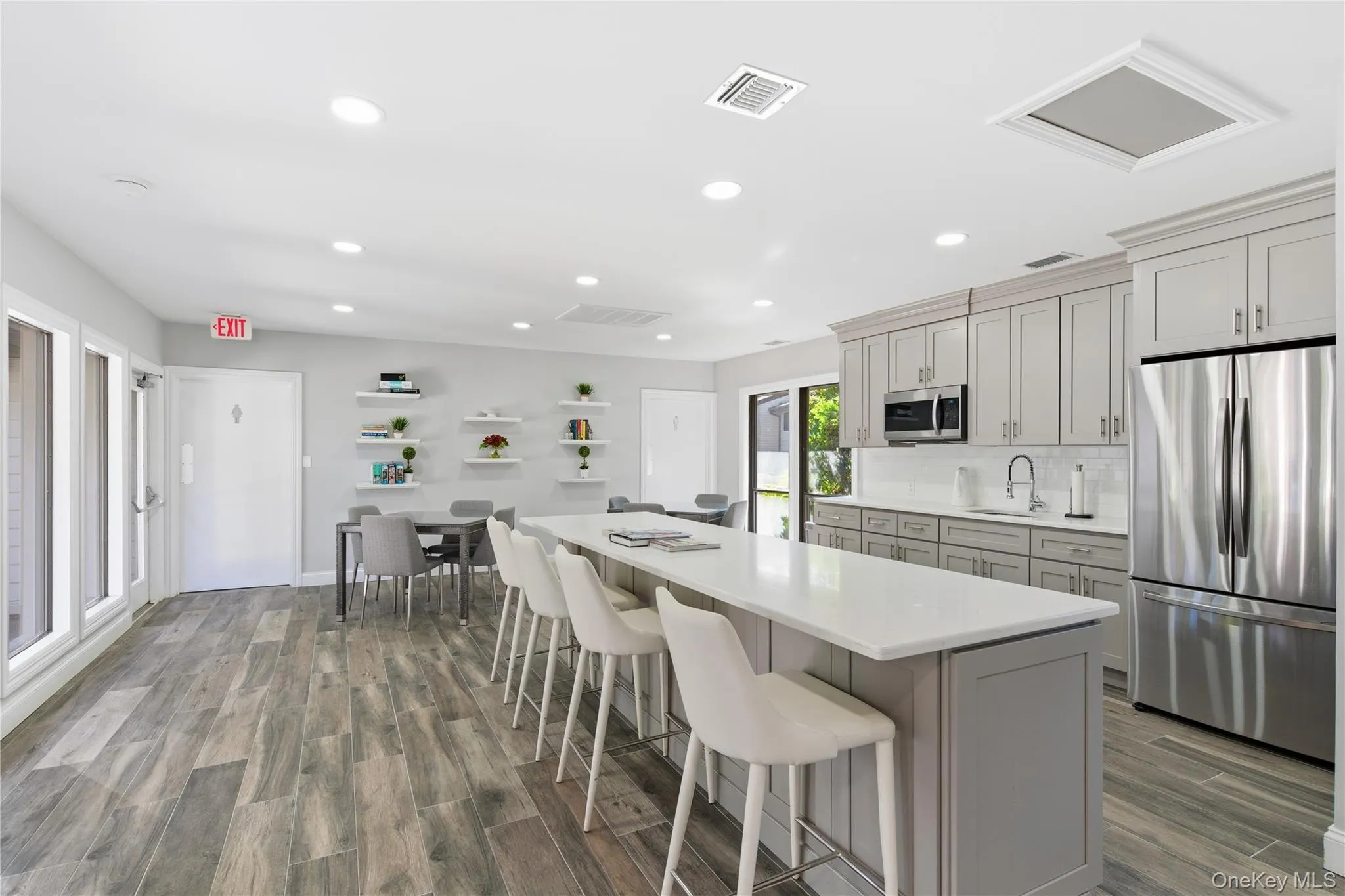 Elegant Clubhouse showcasing a renovated kitchen , perfect for hosting parties and special occasions. Elegant Clubhouse showcasing a renovated kitchen , perfect for hosting parties and special occasions.