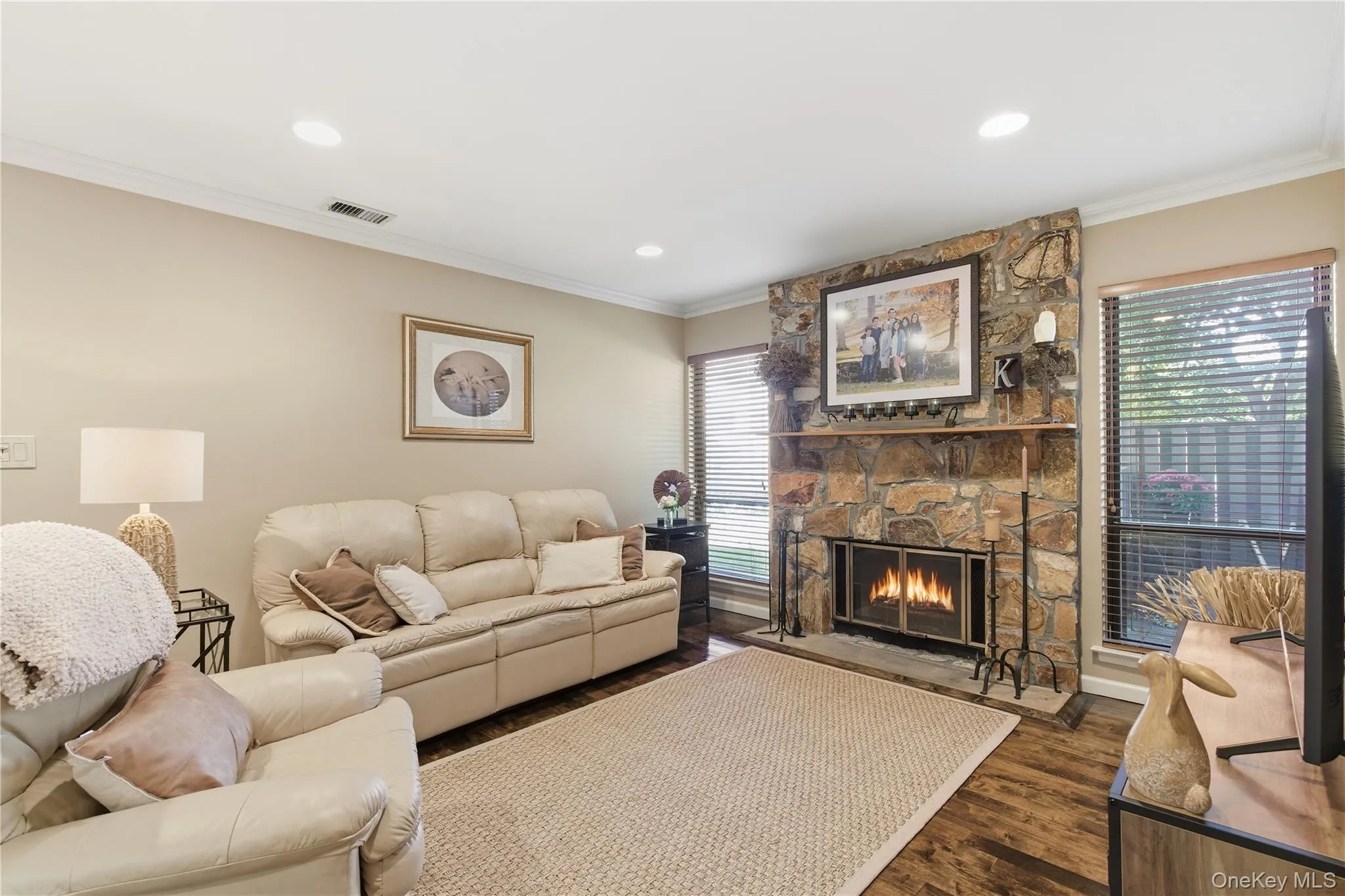 Inviting den featuring a beautiful wood burning fireplace Inviting den featuring a beautiful wood burning fireplace
