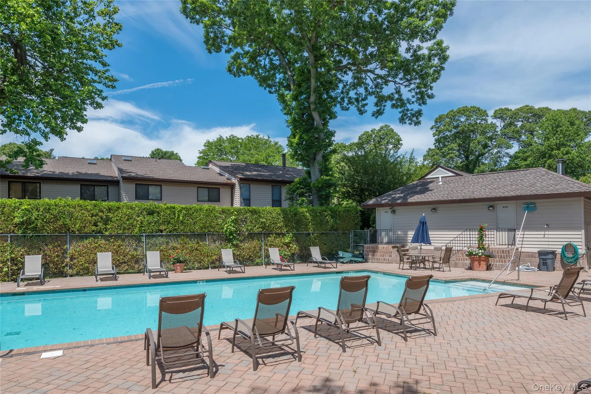 Beautifully designed pool area creating a luxurious vacation-like atmosphere right at home Beautifully designed pool area creating a luxurious vacation-like atmosphere right at home