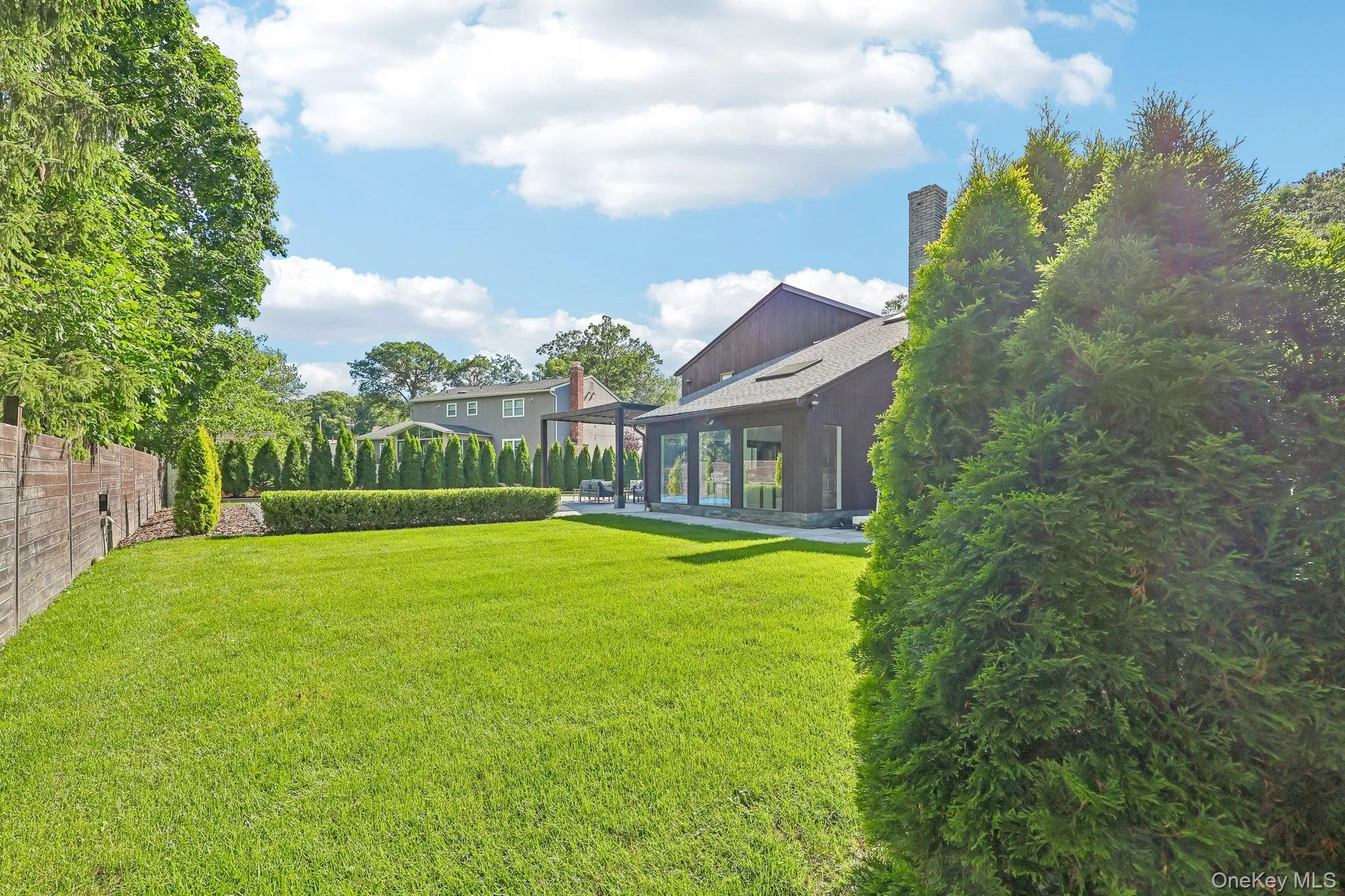 Plenty of lush, level yard for running around, pets and play! Plenty of lush, level yard for running around, pets and play!