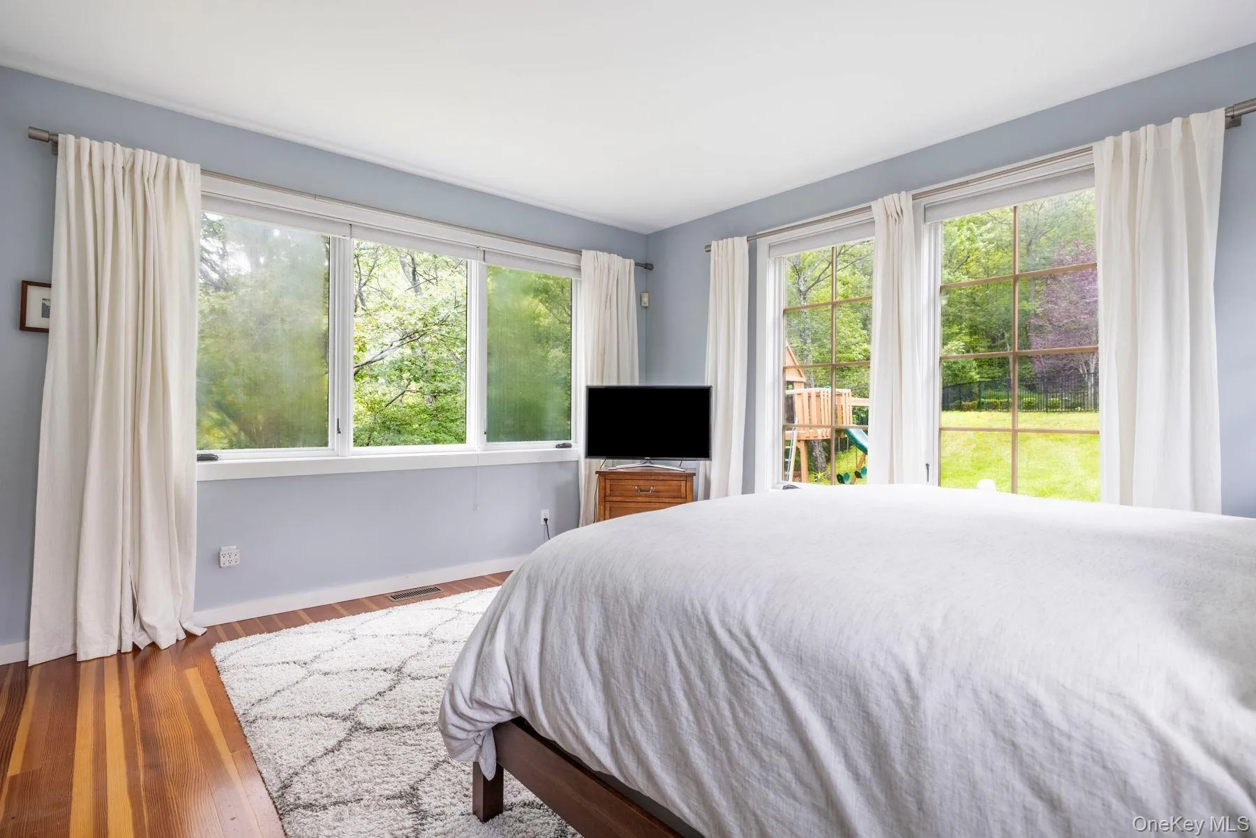 Primary ensuite bedroom with walk in closet and built in shelving Primary ensuite bedroom with walk in closet and built in shelving