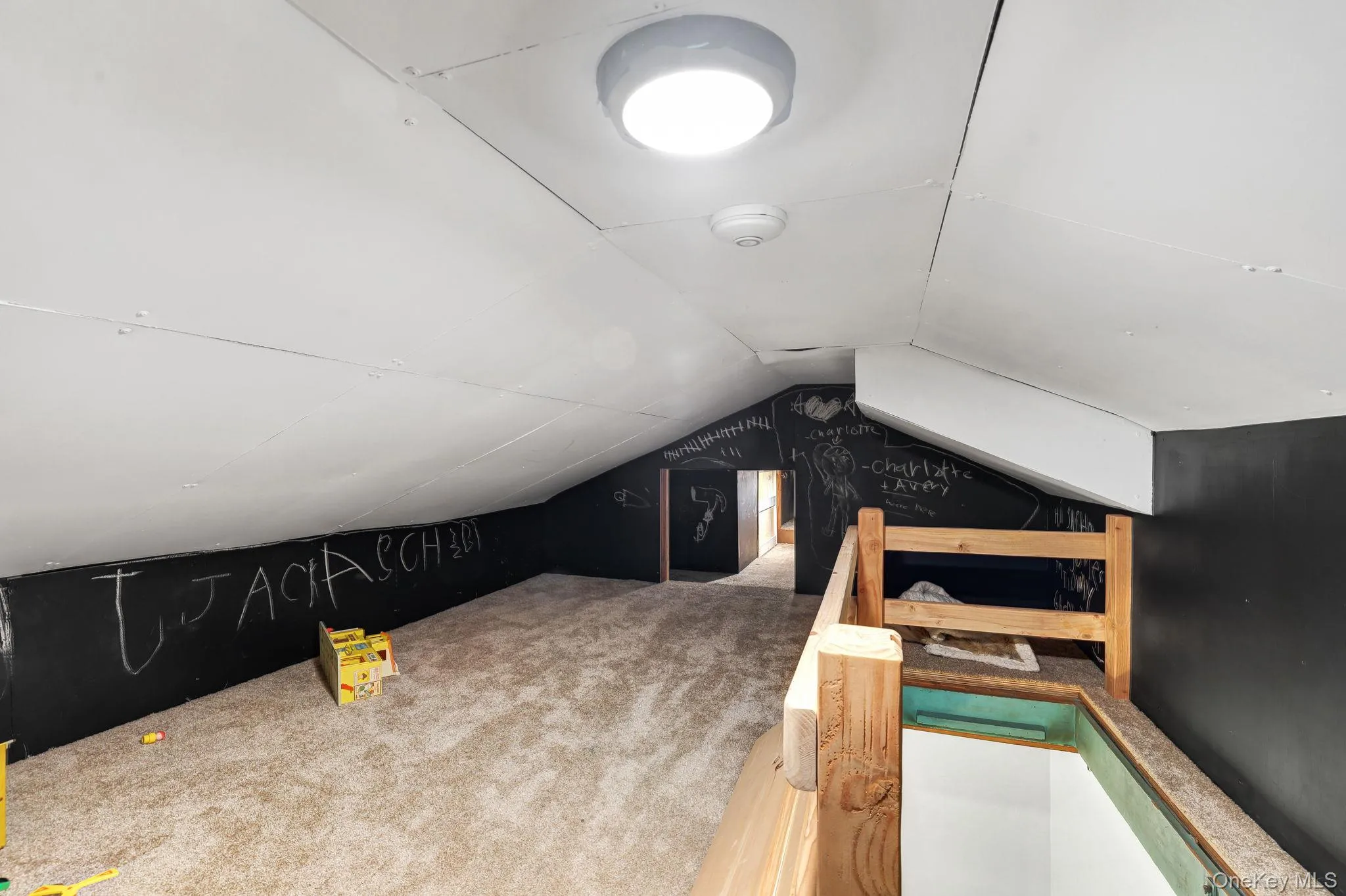 Carpeted play space for kids. Carpeted play space for kids.