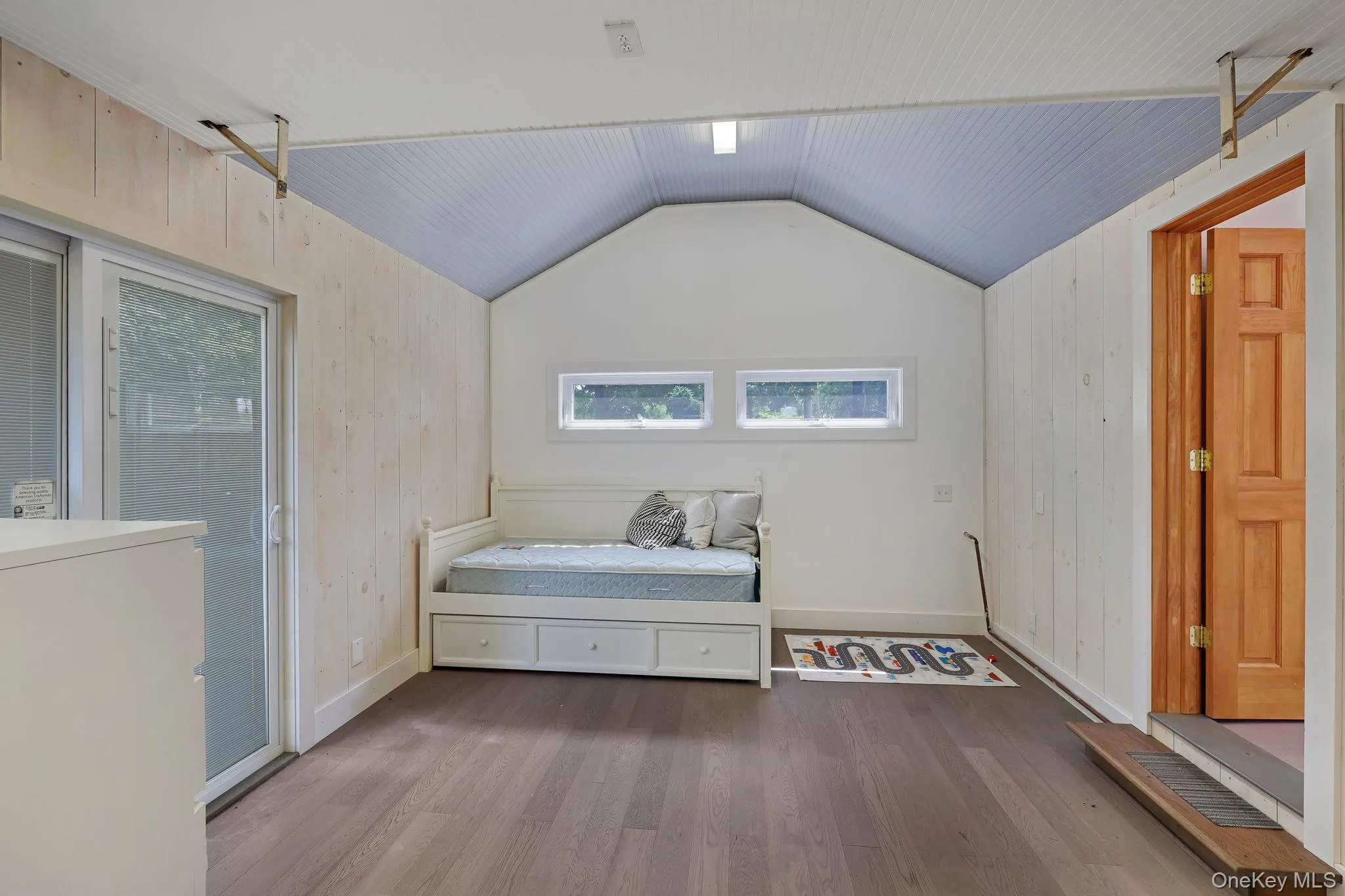 Den used as a Bedroom, with radiant heated floor Den used as a Bedroom, with radiant heated floor