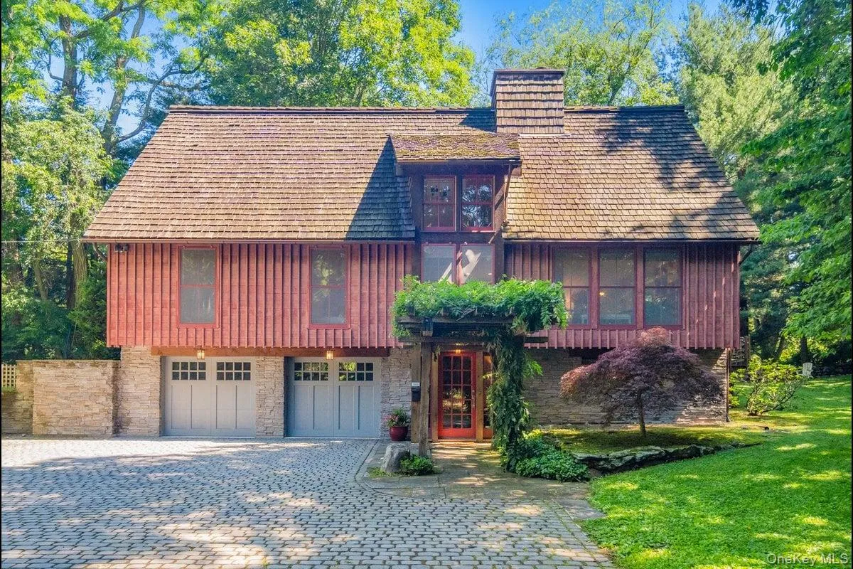 Crafted with wood and stone siding and topped with a cedar shingle roof, it is designed to complement its natural surroundings. Crafted with wood and stone siding and topped with a cedar shingle roof, it is designed to complement its natural surroundings.