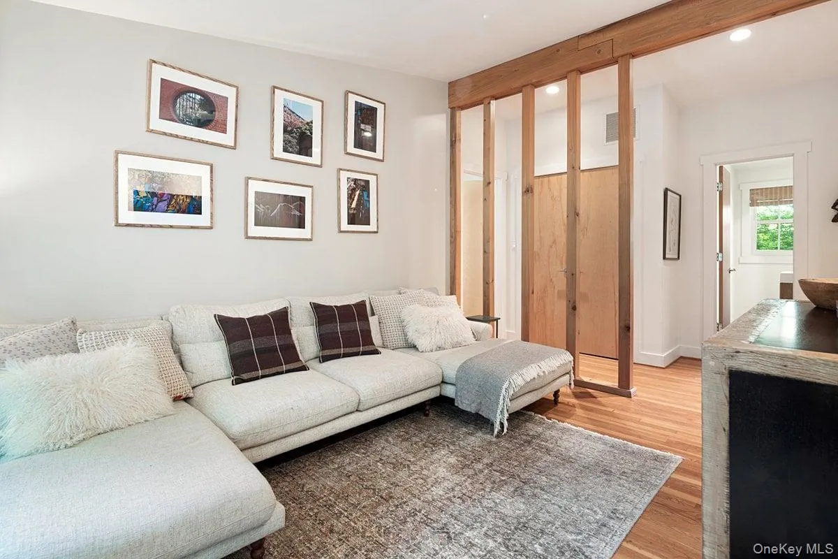 A cozy den is thoughtfully set apart from the main living area, yet remains open, offering a quiet escape without disrupting the flow. The half bath is just across the hall. A cozy den is thoughtfully set apart from the main living area, yet remains open, offering a quiet escape without disrupting the flow. The half bath is just across the hall.
