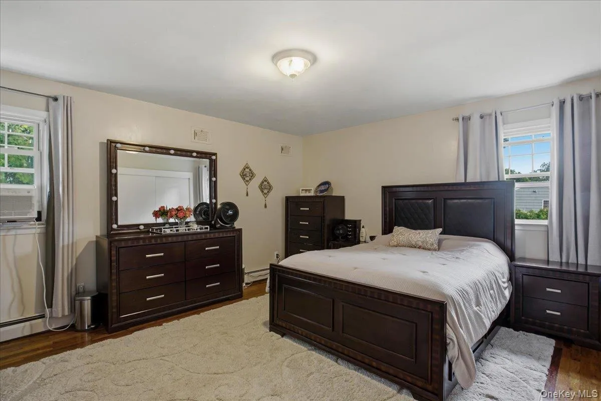 Master bedroom. Hardwood-style flooring throughout Master bedroom. Hardwood-style flooring throughout