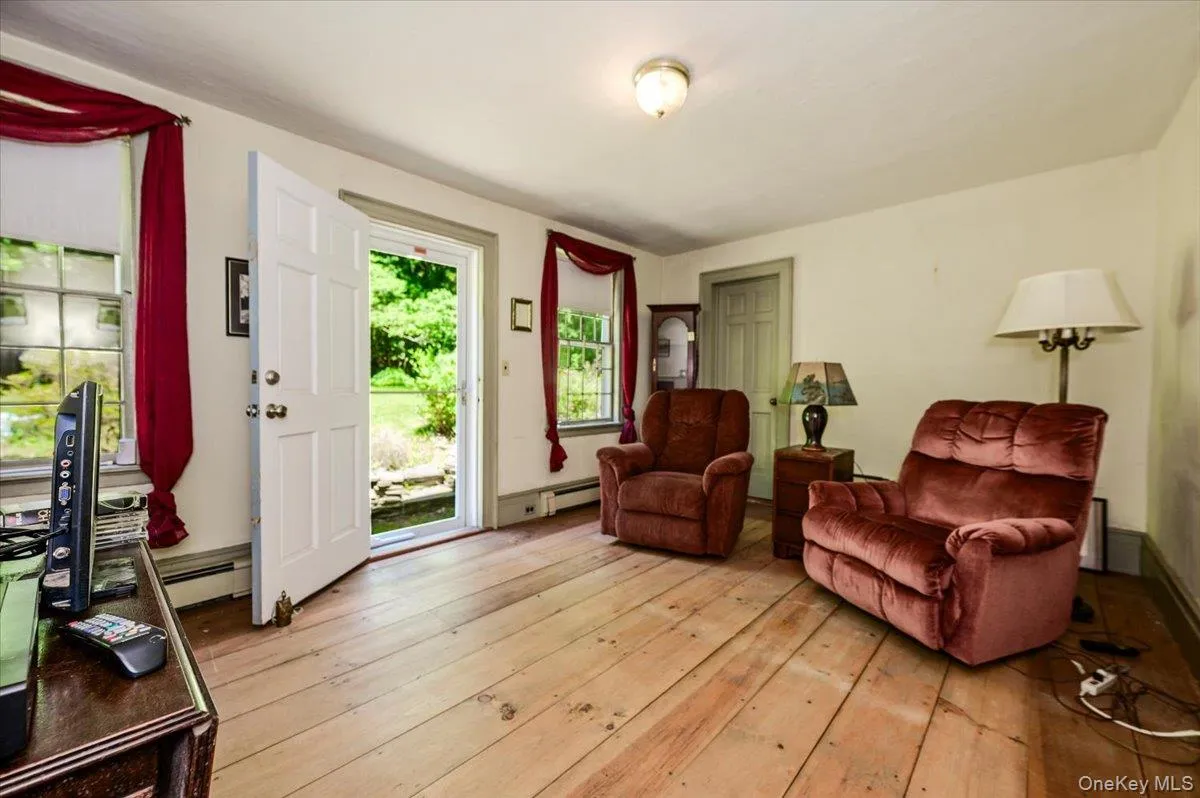 Hardwood floors and oversized windows. Hardwood floors and oversized windows.