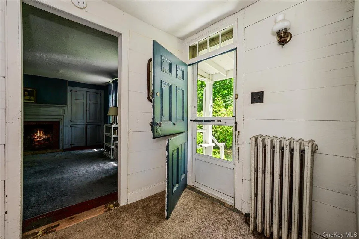 Front entrance with original dutch door. Front entrance with original dutch door.