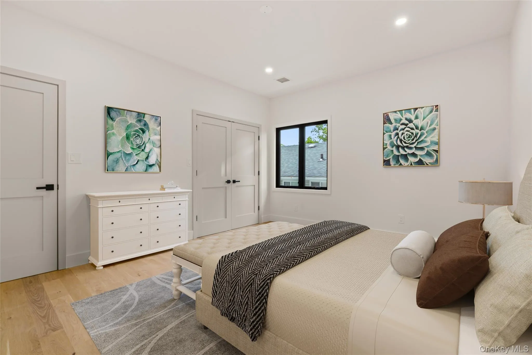 Bright interior with light wood-finish flooring Bright interior with light wood-finish flooring