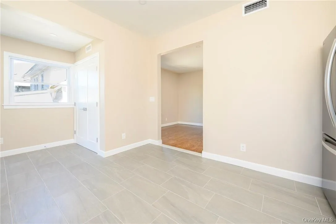Eat in kitchen with view of the private laundry closet. Eat in kitchen with view of the private laundry closet.