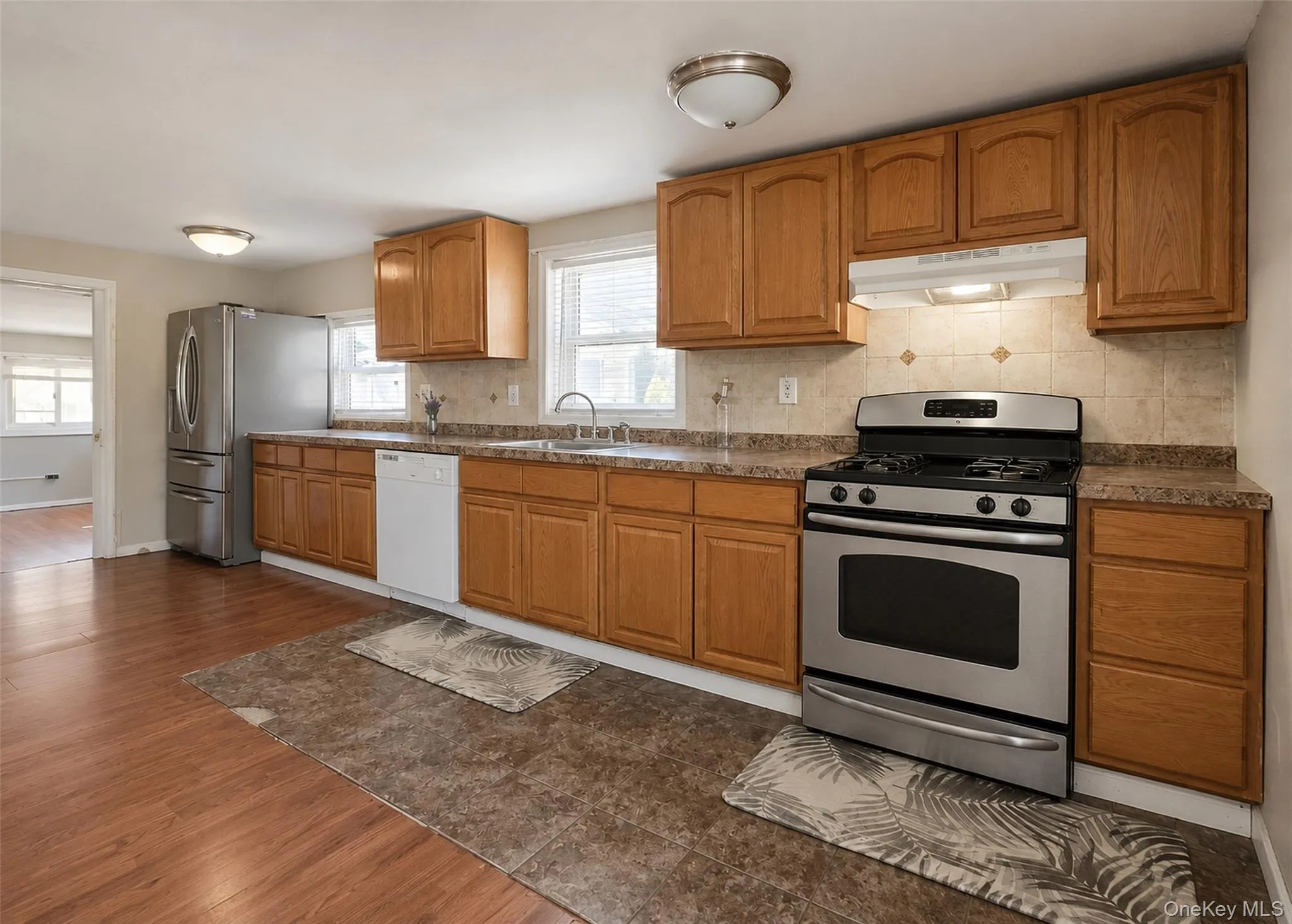 Updated Stainless French Door Refrigerator & Gas Stove. Updated Stainless French Door Refrigerator & Gas Stove.