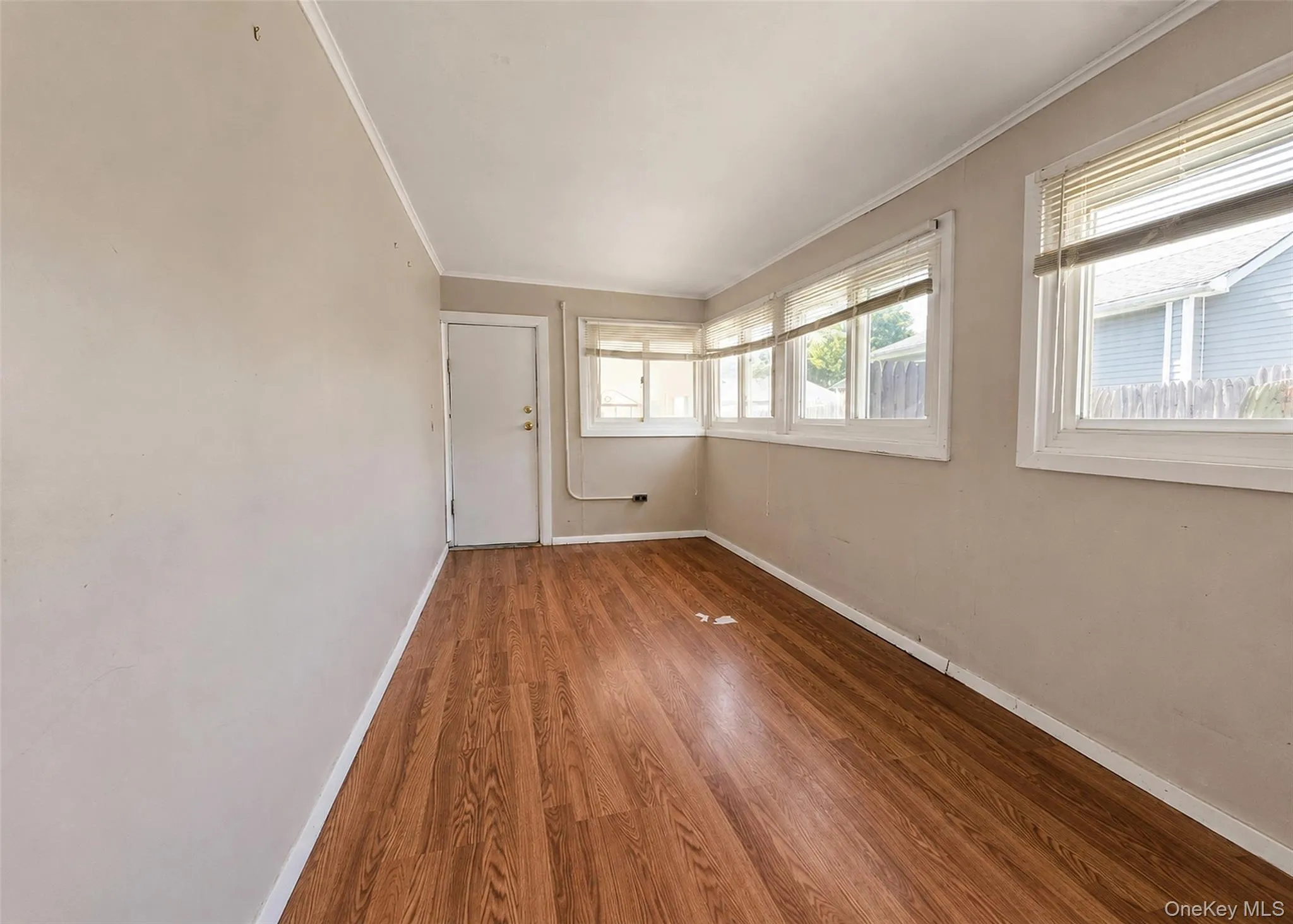 Great Home Office Space Or Playroom Which Leads To Sunroom. Laminate Wood Flooring. Great Home Office Space Or Playroom Which Leads To Sunroom. Laminate Wood Flooring.