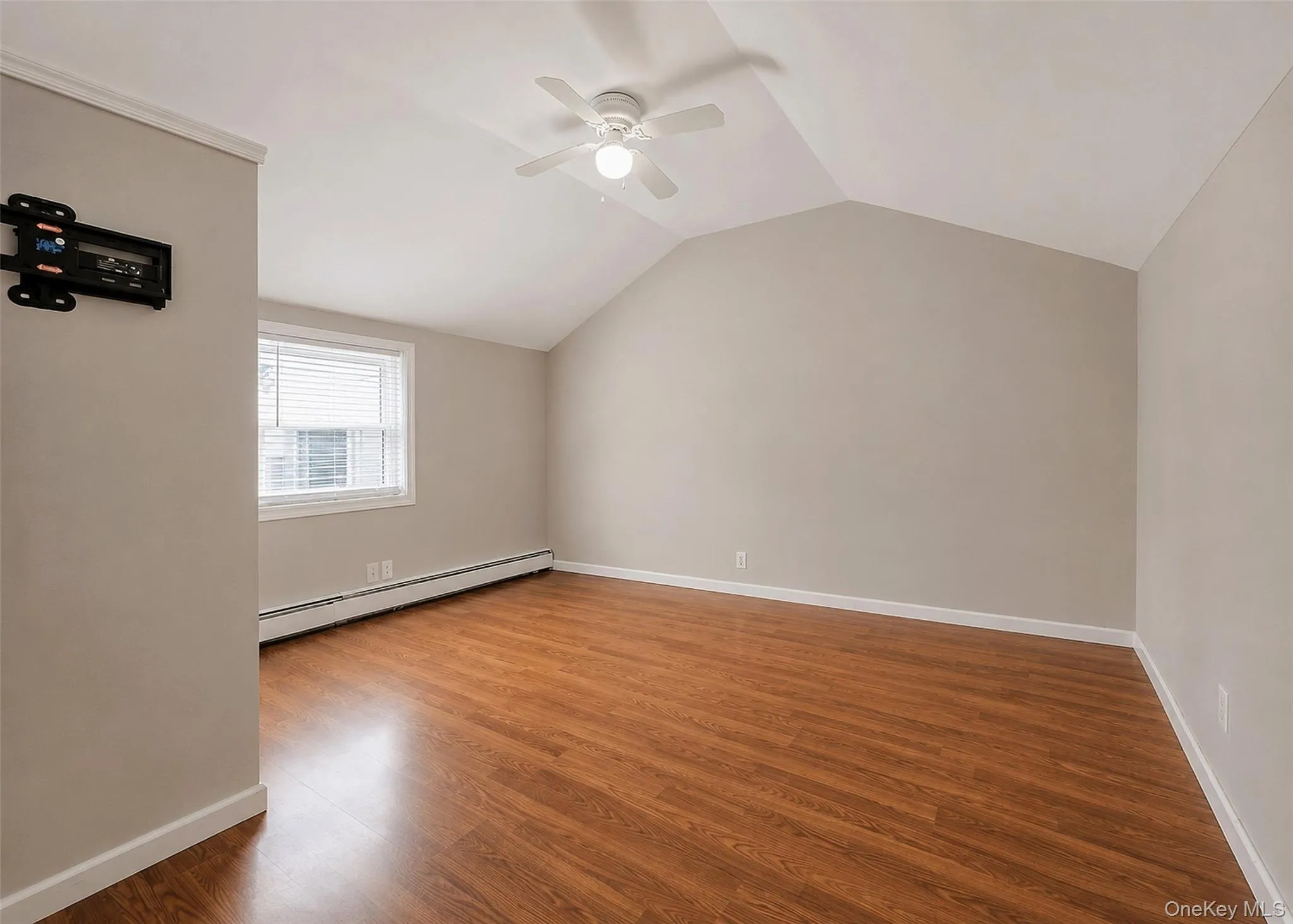 Primary Bedroom W/Vaulted Ceiling. Primary Bedroom W/Vaulted Ceiling.