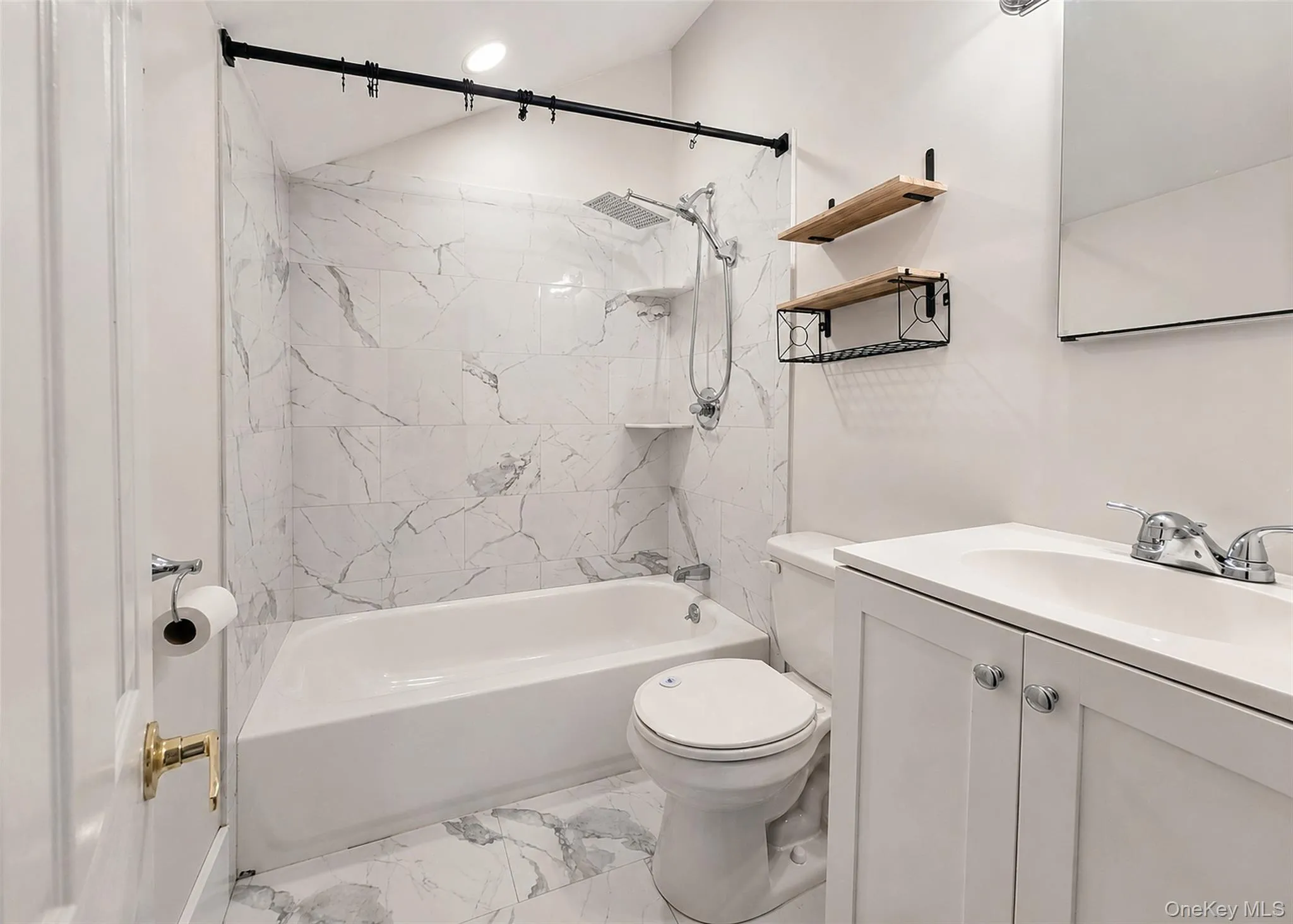 2Yr Old Full Bath. Tub/Shower Combo. Carrera Marble-Like Tile Flooring & Shower Wall. 2Yr Old Full Bath. Tub/Shower Combo. Carrera Marble-Like Tile Flooring & Shower Wall.