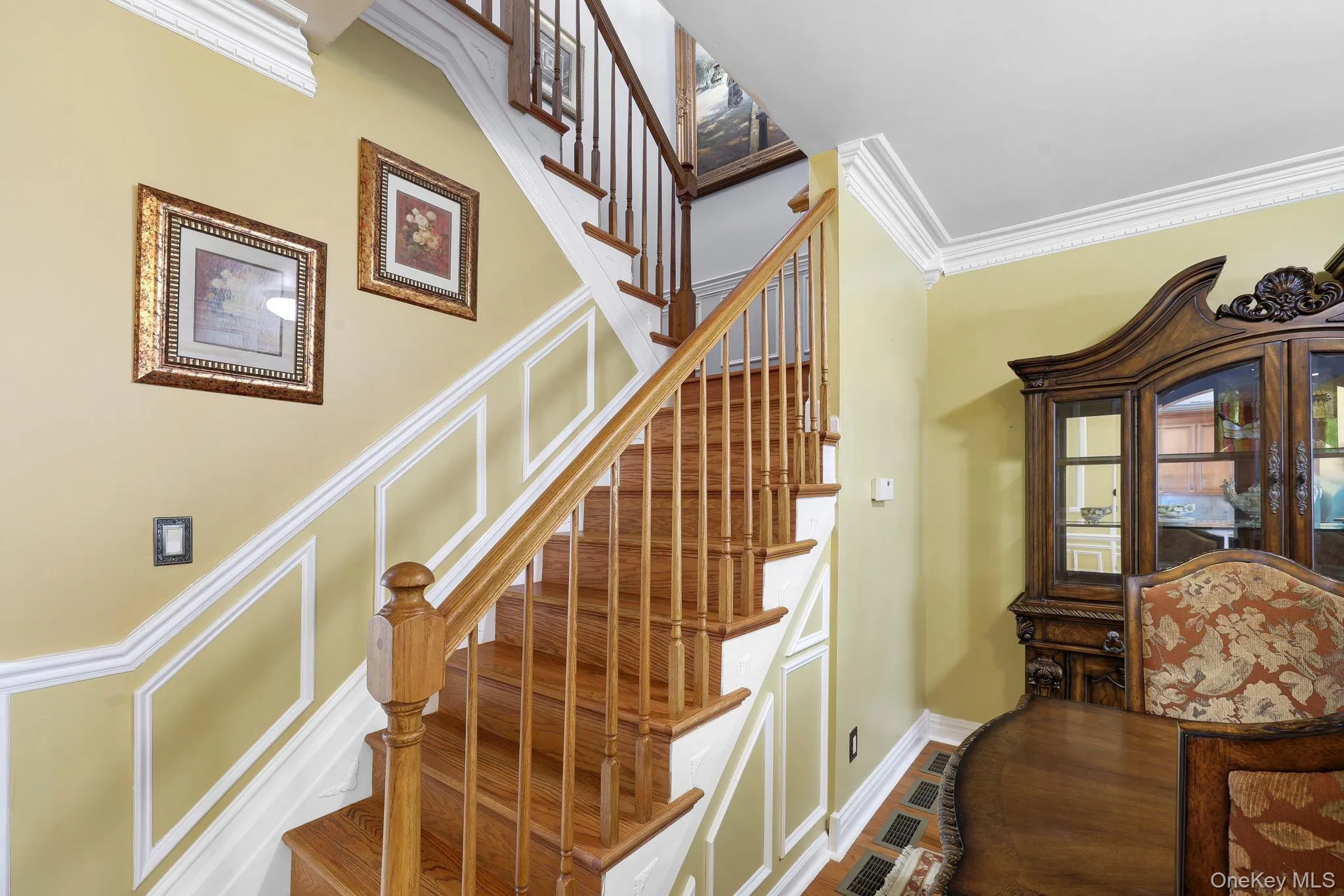 Hardwood staircase with natural wood treads and balusters Hardwood staircase with natural wood treads and balusters