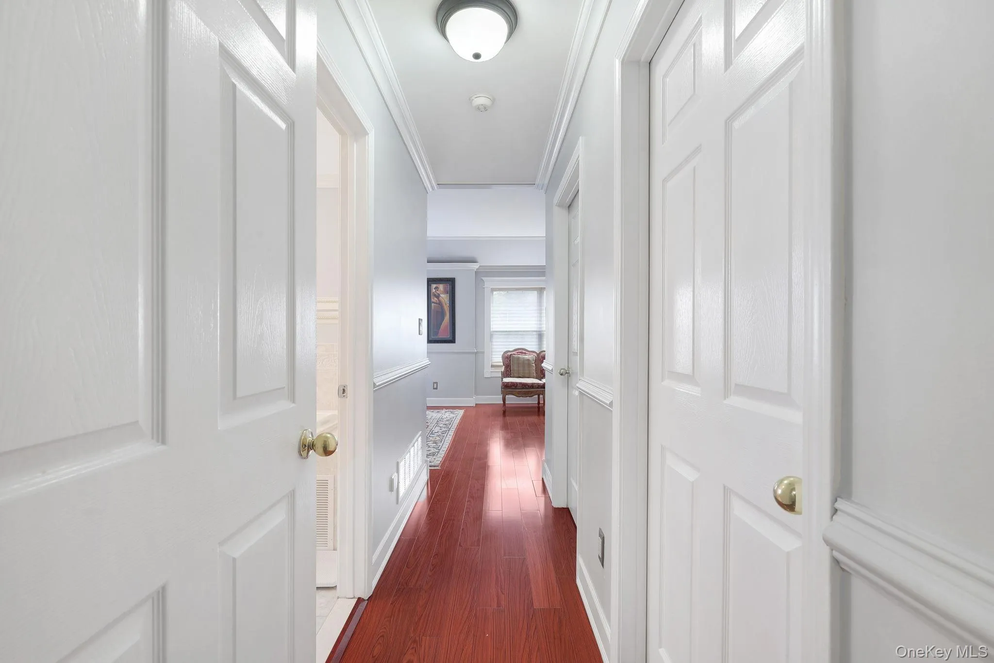 Hallway leading to primary bedroom Hallway leading to primary bedroom