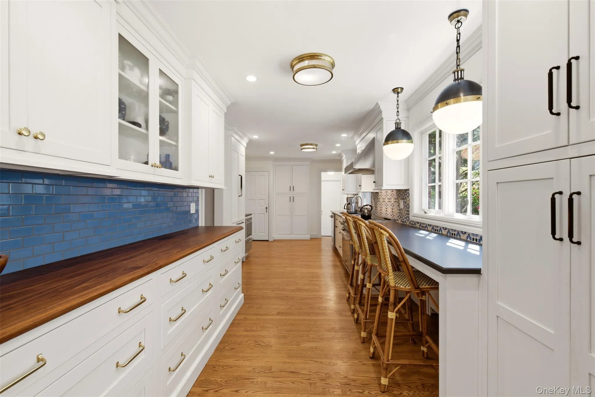 Kitchen with breakfast bar and Amazonite counters Kitchen with breakfast bar and Amazonite counters