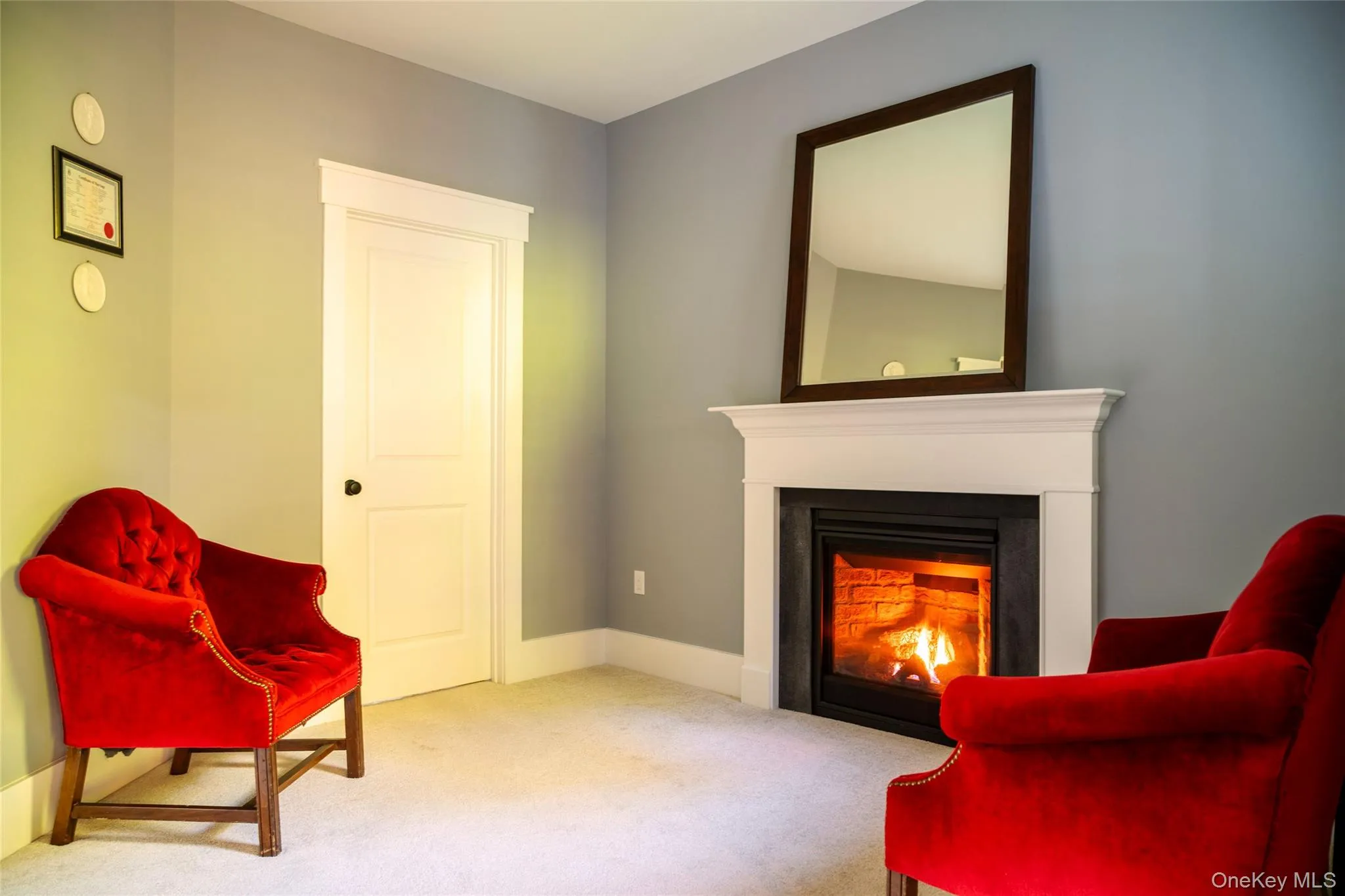 Primary Bedroom sitting area with gas fireplace Primary Bedroom sitting area with gas fireplace