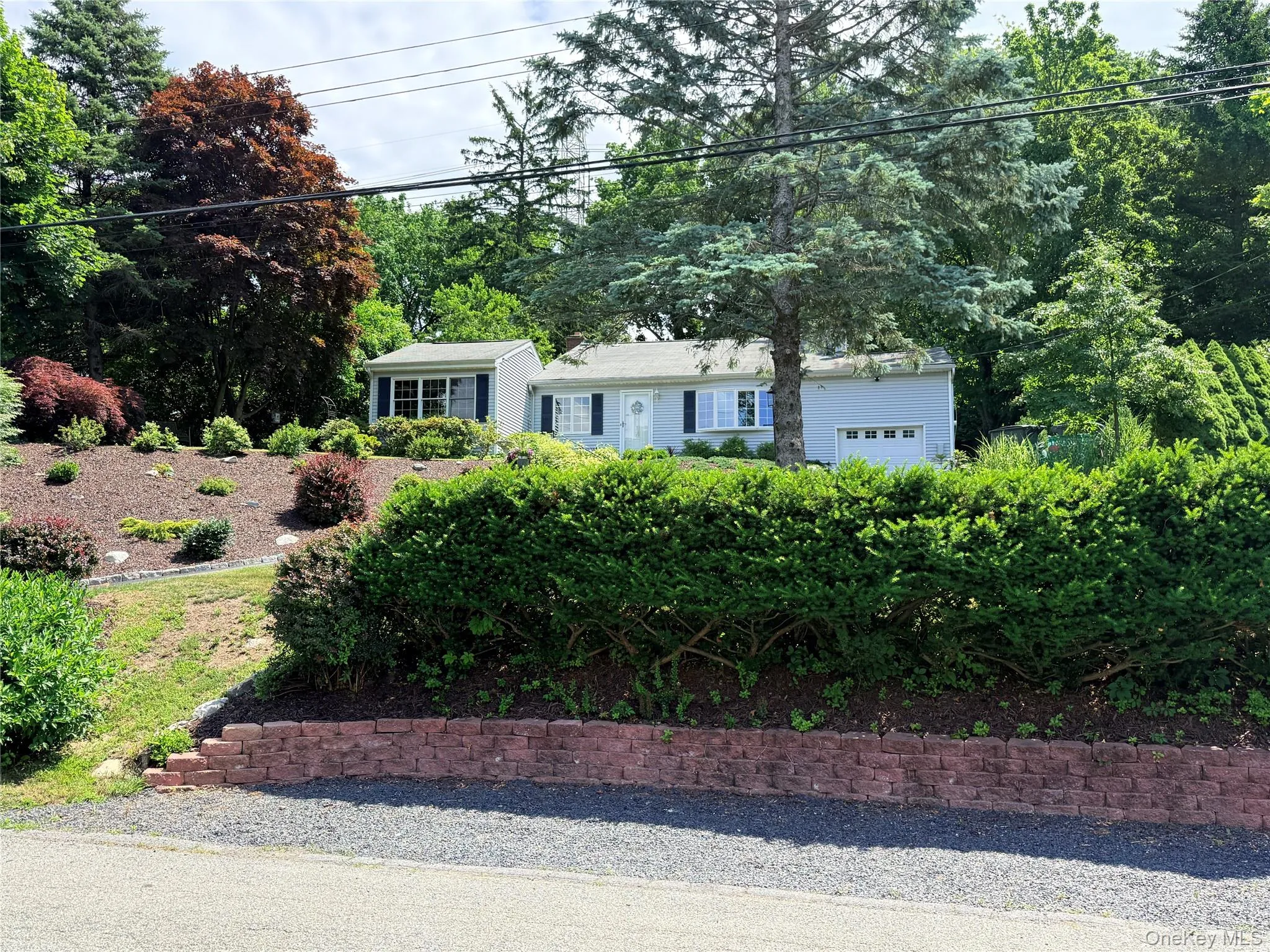 Retaining wall with additional off street parking Retaining wall with additional off street parking