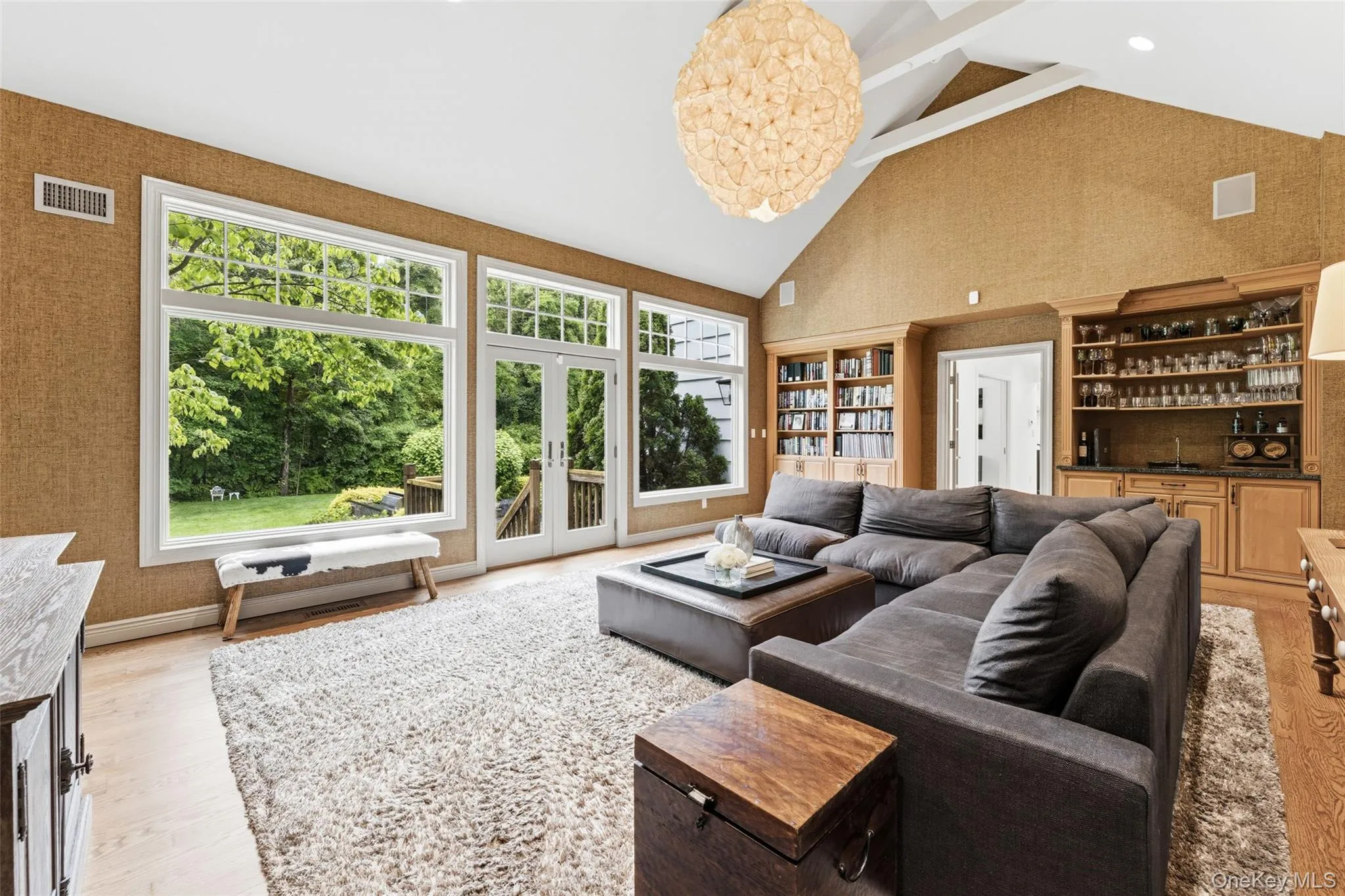 Spacious family room with wet bar for entertaining Spacious family room with wet bar for entertaining