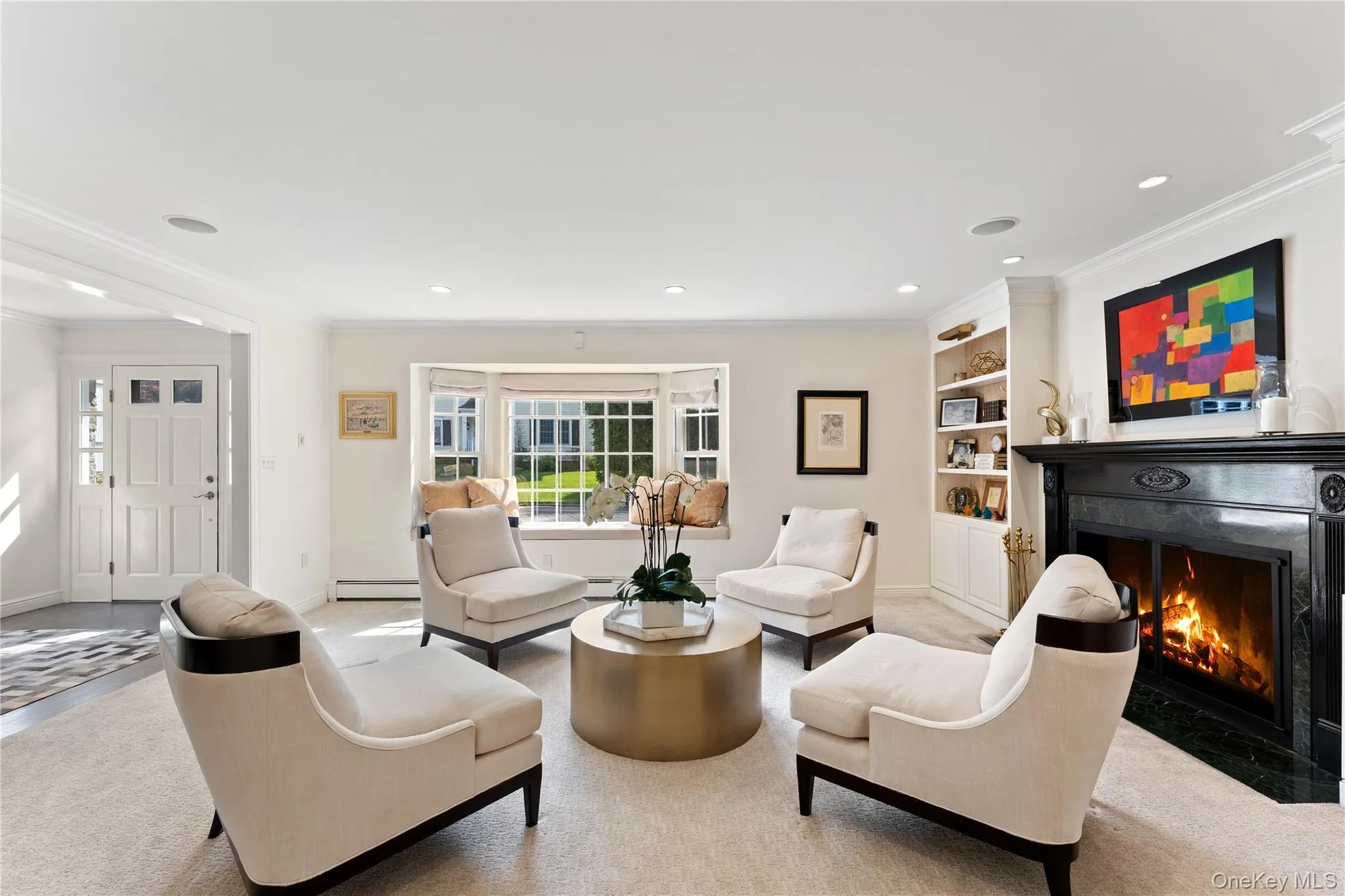 Classic and elegant formal living room with fireplace Classic and elegant formal living room with fireplace
