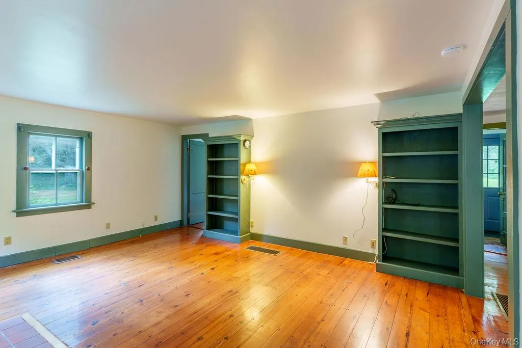 Living Room with built-in bookcases. Living Room with built-in bookcases.