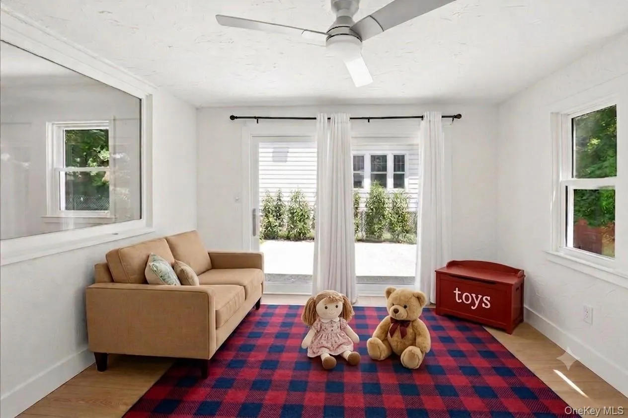 VIRTUALLY STAGED. The first floor family room has sliding doors to a patio and is right off of the kitchen. VIRTUALLY STAGED. The first floor family room has sliding doors to a patio and is right off of the kitchen.