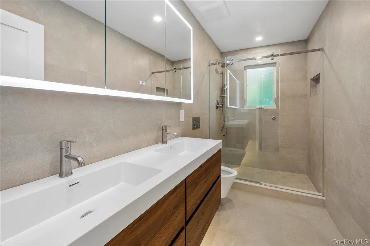 This brand new bathroom is ensuite in the primary! This brand new bathroom is ensuite in the primary!