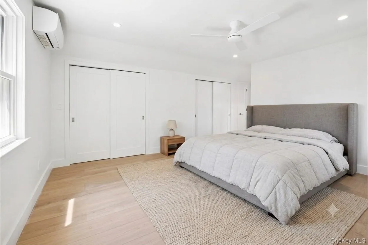 VIRTUALLY STAGED. Upstairs is a large bedroom which can also serve as the primary. It has a wall of closets and it's own brand new bath. VIRTUALLY STAGED. Upstairs is a large bedroom which can also serve as the primary. It has a wall of closets and it's own brand new bath.